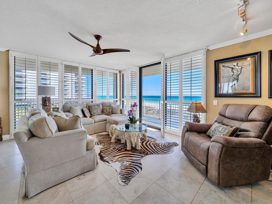Experience the ultimate beach lifestyle in this highly sought-after front unit at Mainsail, boasting stunning panoramic Gulf views. This 2-bedroom, 2-bathroom residence spans 1,315 square feet and features a large wrap-around balcony over 50 feet long, offering breathtaking beach vistas from every angle. Originally designed as a 3-bedroom unit, the third bedroom has been elegantly transformed into a dining room, with the option to easily revert it back to a Gulf-front bedroom.The spacious master bedroom is a true retreat, featuring magnificent Gulf-front views and direct access to the balcony, perfect for enjoying morning coffee or evening sunsets. This unit is one of only 16 in the complex with this unique floor plan, making it a rare find that seldom comes on the market. The chef's kitchen is a delight, showcasing granite tile countertops, white appliancesincluding a glass-top stoveand a breakfast bar that frames exquisite views. The expansive open living area is adorned with plantation shutters and beautiful travertine floors, creating a warm and inviting ambiance. For added entertainment, a wet bar completes the living space.

Mainsail Condominium offers a wealth of amenities, including two pools, a hot tub, covered parking, tennis courts, shuffleboard, pickleball, a game room, and a fitness center, ensuring endless opportunities for recreation and relaxation. With over 700 feet of pristine beachfront along the Gulf of America, this unit is an exceptional opportunity for a second home or rental investment. Don't miss out on owning your slice of paradise with captivating views of emerald waters and golden sands. See you at the beach!