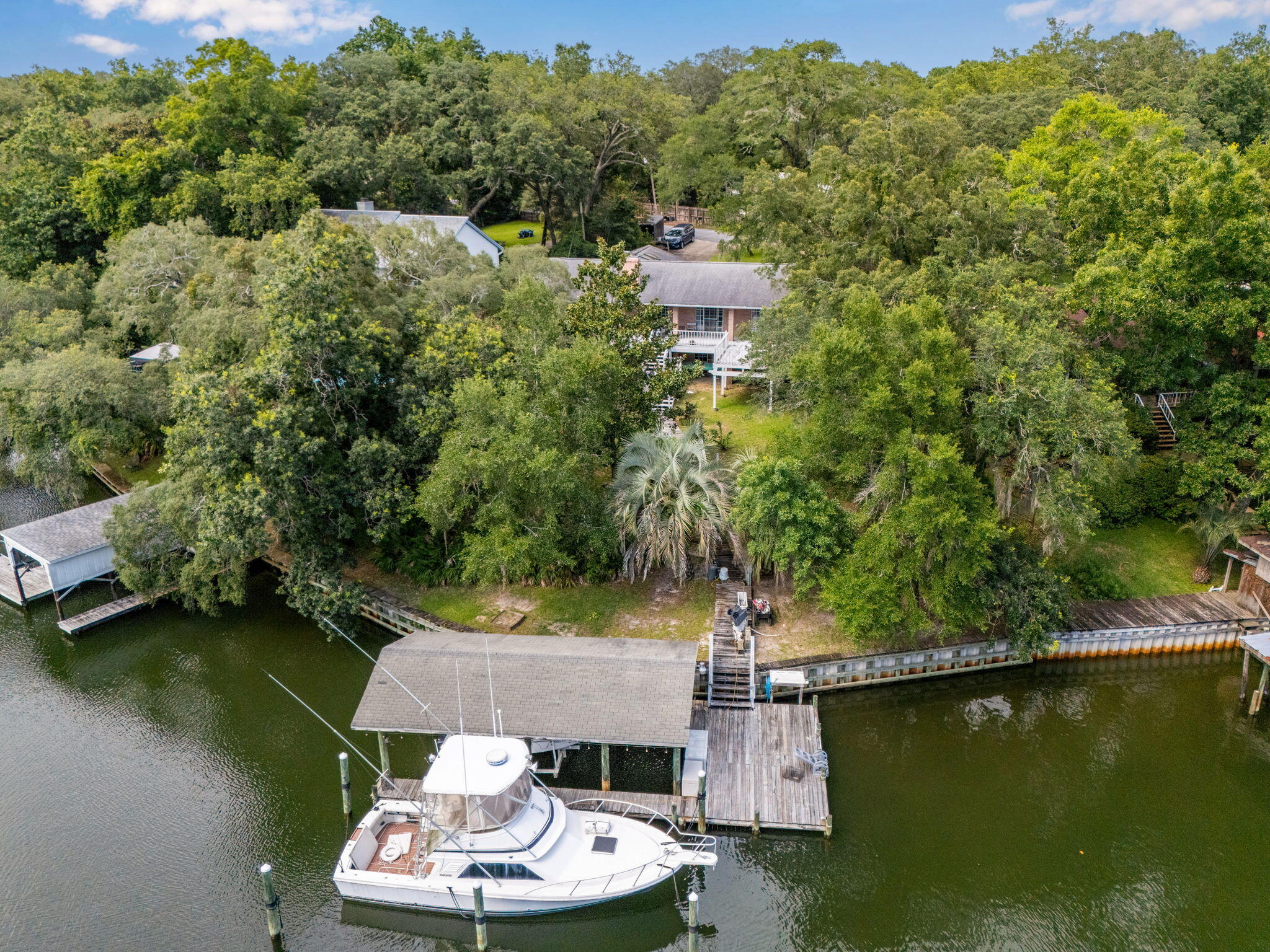 Enjoy waterfront living in this spacious 4-bedroom, 3-bathroom home on the bayou in Fort Walton Beach. This beautifully designed home features engineered hardwood floors and a bright, open floor plan perfect for entertaining. Step out onto the back patio or deck to take in stunning bayou views, or head to your private dock complete with a boat slip and lift--ideal for boating enthusiasts. A rare opportunity to own a slice of paradise with comfort, space, and scenic charm.