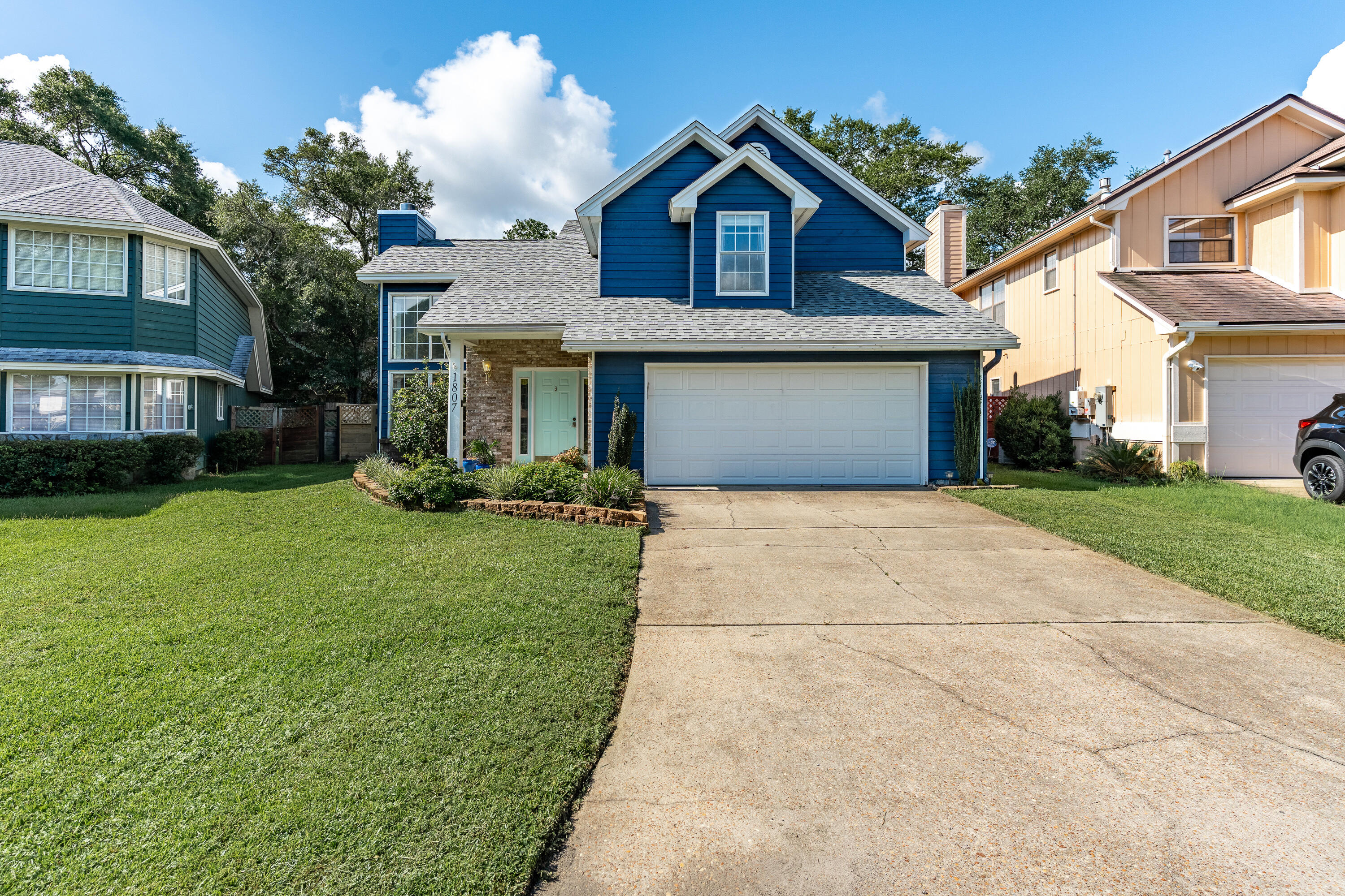 Welcome to this beautifully updated two-story home, ideally located in a highly desirable neighborhood just 6 miles from Eglin Air Force Base, 8 miles from Hurlburt Field, and only 7 miles from the pristine white sandy beaches of the Emerald Coast. This meticulously maintained 3-bedroom, 2.5-bath residence offers a perfect blend of style, comfort, and functionality. Interior features include engineered hardwood flooring throughout, quartz countertops in the kitchen, and sleek stainless steel appliances. The spacious living room boasts soaring cathedral ceilings and abundant natural light, creating an open and inviting space for relaxing or entertaining. Upstairs, the generously sized master suite provides plenty of room for your furnishings and personal retreat. Additional highlights include an indoor laundry room conveniently located near the garage, a new roof installed in 2023, and a Sentricon system with Terminix for added termite protection. Hurricane shutters for all window openings further enhance the home's safety and may help lower insurance premiums. With a VA assumable loan at an attractive 4.99% interest rate and no gap required, this home offers an exceptional opportunity for qualified buyers. The washer and dryer convey AS-IS