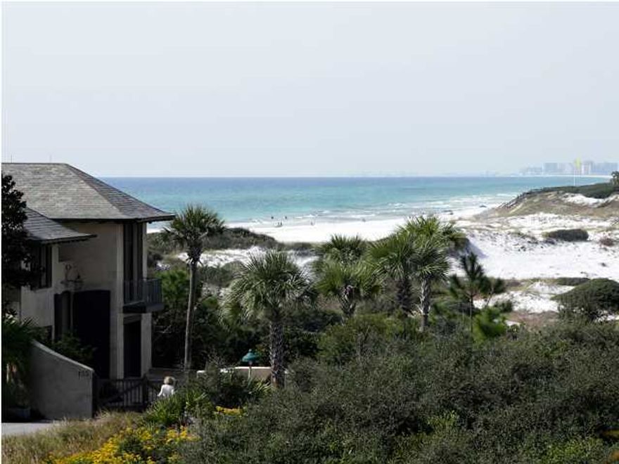The Retreat is one of South Walton's most unique and exclusive neighborhoods, located directly on the Gulf of Mexico and south of Scenic Highway 30A. The Retreat offers owners unparalleled privacy, serenity and security. Upon entering the neighborhood, it is clear that conservation is paramount. An amazing amount of conservation land creates the sense of being in the middle of nowhere. Existing homes and homes under construction flow with the varying elevations of the land, maximizing views of not only the Gulf, but of Draper Lake as well. This particular lot sits at the west end of The Retreat near Draper Lake and the Gulf front dune conservation.