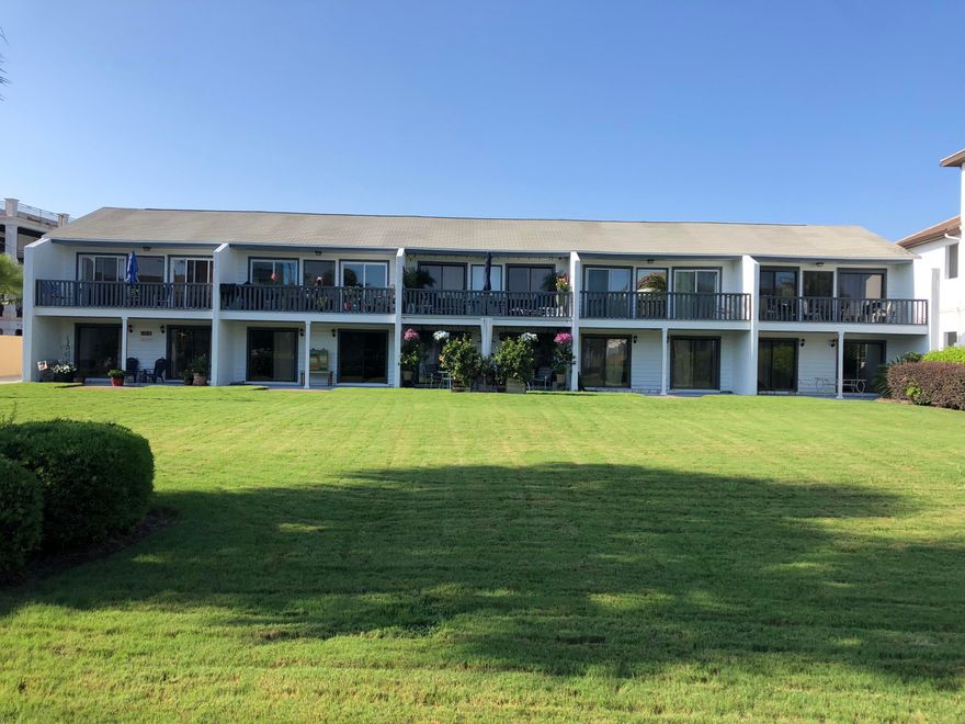 Great two story townhome, with garage and a view of the gulf!! Two bedrooms and two full baths on first floor. The living, kitchen and a half bath are on the second floor. Fully tiled throughout. Completely repainted. Washer and dryer in garage. $500 security deposit required.