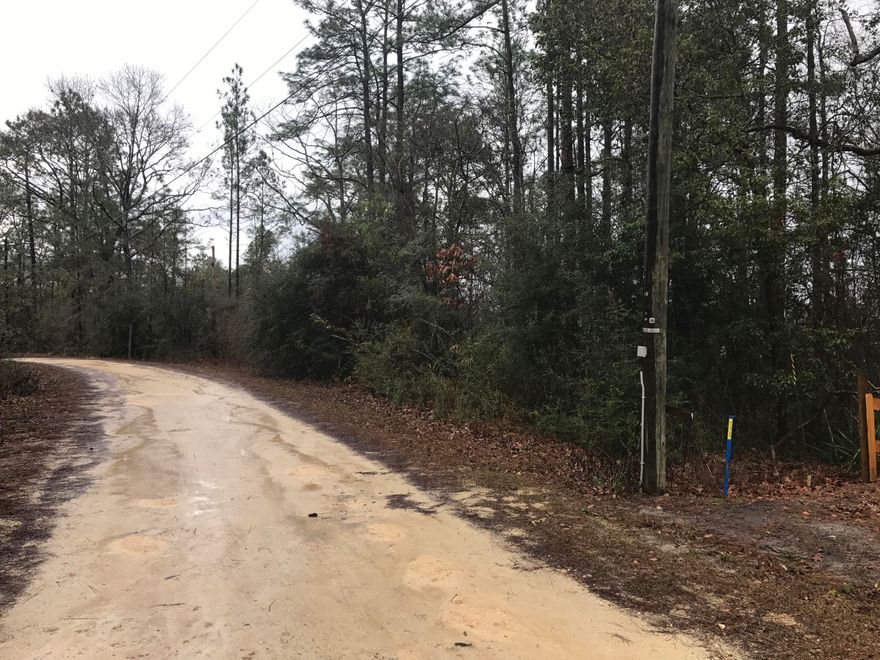 WANT PEACEFUL LAKEFRONT LIVING? Beautiful almost one acre wooded waterfront lot in Spring Lake Estates. Come build your dream home in this quiet, country setting S/D. No rentals or mobile homes allowed. There is a dock on the property. This lot is a must see!!!