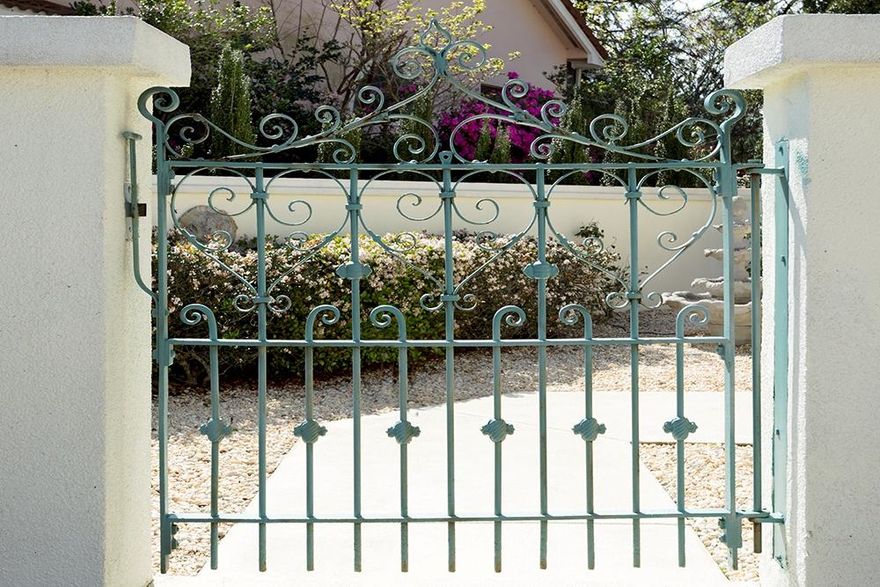 Exquisite! This home is designed & loved by a resident world traveler! European inspired, quality custom built & professionally decorated, this bay side residence boasts finishes imported from France & Italy. Add a breathtaking view of Choctawhatchee Bay & the 16th hole of The Emerald Bay Golf Course from every room and you have a truly special home! Argentinian Granite, French Limestone, Carrarra Marble, Walker Zanger Tile and imported porcelain fixtures are just of few of the superior finishes in this stunning home. A quaint wrought iron entry gate opens onto the lighted, private, sunken garden with fountain. Follow the walkway to the beautiful Anderson full view double entry doors. Notice the specially designed custom cast Lion Head insets above the front windows.