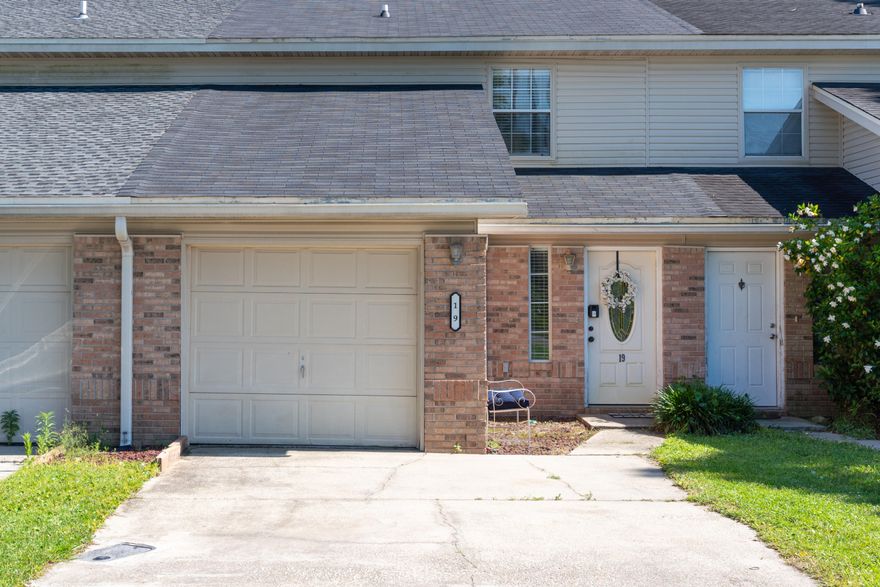 Updated town home with two master suites! Freshly painted throughout. Slate entryway leads you to an open floor plan. Living/dining room has hardwood flooring and plenty of natural light. The kitchen boasts stainless steel appliances, new counter tops, and a large breakfast bar. A half bath is conveniently located on the first floor. Patio doors open up to the privacy fenced backyard. Upstairs you will find a generously sized linen closet and two master suites! Each bedroom has it's own private bath. This home is centrally located between both bases, and close to shopping.