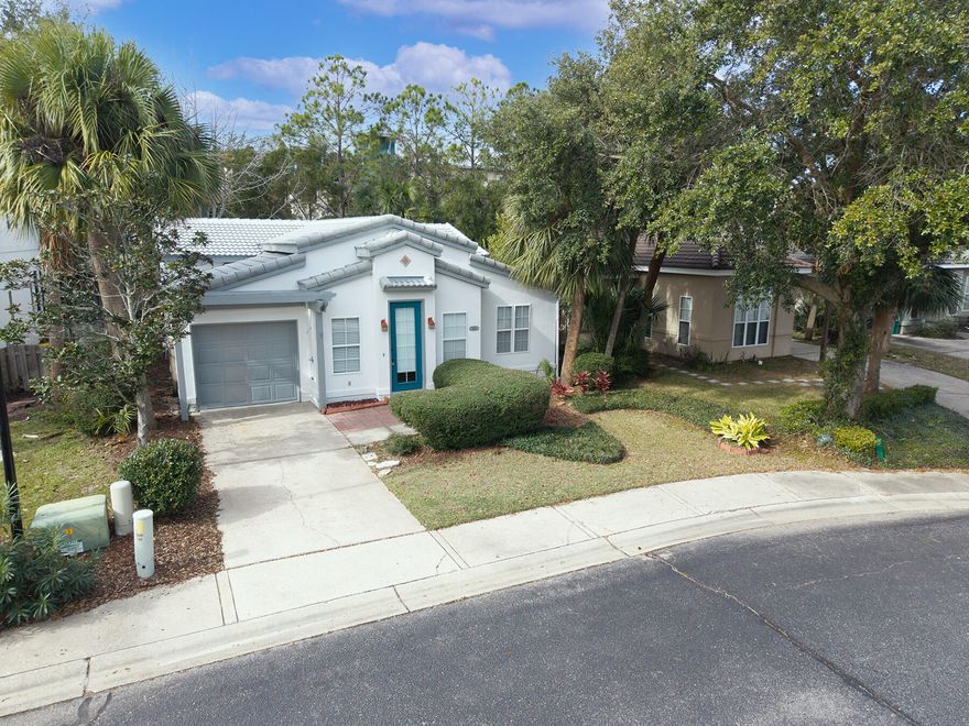 Every morning begins with life at the beach. Tucked inside the Tuscany community on Destin's east end, this home sits just half a mile from the beach--just enough to feel the coastal rhythm, yet removed from the bustle. The neighborhood wakes quietly, designed for those who value long-term living and a true sense of home.Step inside and the space opens up, welcoming you with high vaulted ceilings that let sunlight drift easily from room to room. The home unfolds across 1,502 sq. ft., where three comfortable bedrooms and two baths create a setting meant for both everyday living and entertainment. The kitchen, finished with elegant quartz countertops, becomes a natural gathering place--whether it's slow mornings with coffee or evenings spent sharing stories after a day by the water. Care has been poured into the home, evident in the new roof installed in 2024 and the fresh interior and exterior paint gives everything a clean, refreshed feel. There's comfort in knowing the important updates are already done, leaving nothing but the enjoyment of living here. A one-car garage adds simple convenience, rounding out a home designed to feel effortless.

Life in Tuscany moves at an easy pace. From here, you're moments from Destin's white-sand beaches, top-rated schools, premier golf courses, shopping, and a dining scene that ranges from upscale coastal cuisine to relaxed beachside favorites. And at the end of the day, you return to a neighborhood that feels settled, peaceful, and intentional.

At 108 Mantero Way, the story isn't just about a houseit's about mornings that start unhurried, days shaped by sun and salt air, and evenings that end in a place that truly feels like home.