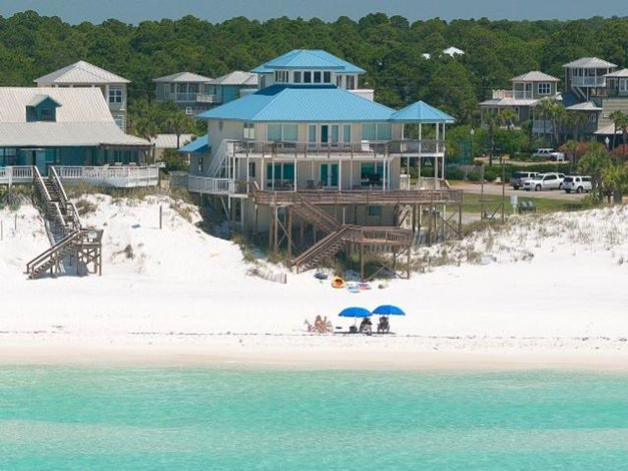 With a name like Out of Sight, this house is sure to amaze. Beautiful Gulf front home with over 68 feet of beach front has 3,000 sq.ft. of outdoor deck space so you can enjoy the beach life to the fullest. This uniquely designed four-story home features 6 bedrooms and sleeps up to 20. Located on the 2nd floor is the newly remodeled kitchen with granite counters, stainless appliances, gas stove and two dining tables and bar seating to accommodate all. Also on the 2nd floor the open living area opens to a large porch and deck for enjoying great gulf views. This house is currently on a vacation rental program and generates over $100,000 in gross rentals yearly. Property sold ''AS-IS''