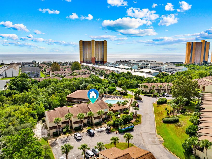 A price that can't be beat. Firm price for a fast sale. Great for investors. Discover the charm of this nostalgic beach vacation rental or transform it into your dream retreat! This fantastic 2-bedroom, 1.5-bathroom condo in the sought-after Portside Community offers an unbeatable location. The property is priced to SELL, a steal for investors; one of the lowest prices on the West End of PCB for a 2 bedroom! Unit J5 is nestled in a serene cul-de-sac, just steps from one of the community pools. Portside stands out as one of the most unique beach communities on the desirable west end, directly across from stunning sugar-white sands and the Gulf. Enjoy local favorites like Thomas Donut, Carousel Supermarket, and Mike's Oyster Bar, all within walking distance. Pier Park is just 2 miles away. And with Beach Access #71 just moments away, you'll have easy access to the shoreline! The primary bedroom features a private balcony and a vanity area equipped with a wash basin (potential to convert it into a full ensuite bathroom, making it a 2-bedroom, 2.5-bathroom unit). This fully furnished, rental-ready condo features an open-concept living area that flows seamlessly into the kitchen and dining space, the covered rear patio also features a lockable storage room for your beach equipment. Upstairs, you'll find two spacious bedrooms and a full bathroom, along with a half bath downstairs, providing ample space for you and your guests to relax and unwind. Portside offers an array of impressive amenities, including a breathtaking waterfall pool with Gulf views, multiple additional pools, a rejuvenating hot tub, tennis courts, pickleball, shuffleboard, a fitness center, and a large clubhouse perfect for social gatherings. The clubhouse is equipped with a full kitchen, multiple TVs, recreational options like ping-pong and pool tables, a cozy library area, and ample space for unwinding. There's truly something for everyone at Portside! As one of the few pet-friendly complexes in the area, Portside attracts a high volume of renters, particularly snowbirds, ensuring excellent rental income potential. Plus, with convenient parking right at your front door in this ground-floor unit, you have everything you need for rental success. Portside boasts some of the lowest HOA fees on the beach! Being just two stories tall, it's also exempt from the new Florida Condo Laws, making it an even more attractive investment. With a prime location, instant equity, and incredible amenities, this condo won't last long. Don't miss your chance to own a piece of paradise in Panama City Beach!