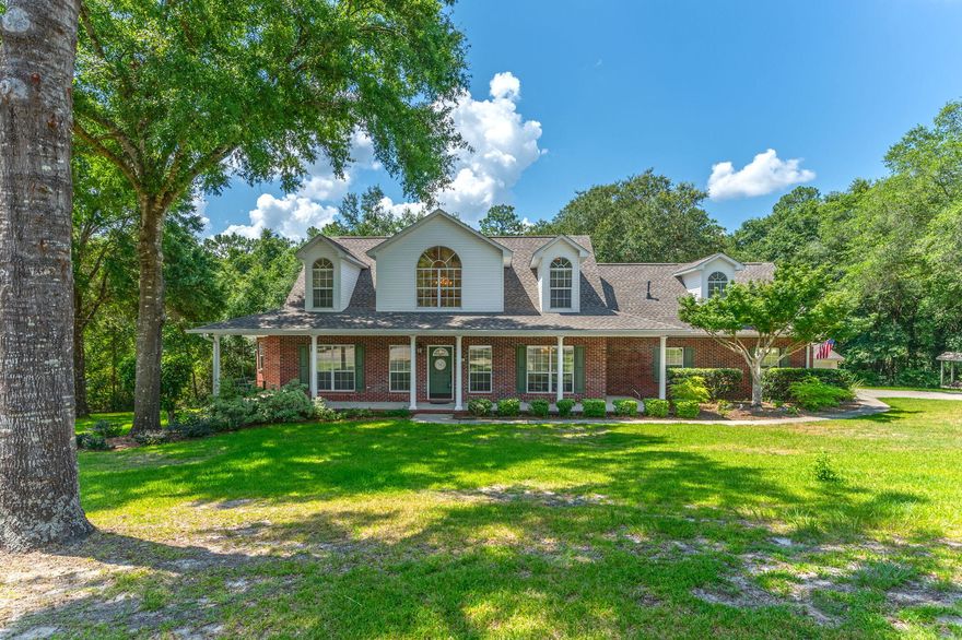 1.06 acre cul-de-sac lot! Neighborhood stocked FISHING LAKE! WORKSHOP! Southern style 2 story with massive porch with porch swing! Huge rear deck! This traditional southern style 2 story home is packed with curb appeal.Roof was replaced July 2020 and the gas water heater is brand new. The oversized foyer features a beautiful staircase and is open to the 2nd floor. The foyer is flanked by a dining room on one side and a den/office on the other. The traditional floor plan features a first floor primary suite and 2 bedrooms with a Jack and Jill style bathroom upstairs. Just off the kitchen is a laundry room (washer and gas dryer convey) with a staircase leading to a BONUS ROOM over the garage. Although the space is finished it isn't heated/cooled so it is not included in the square footage