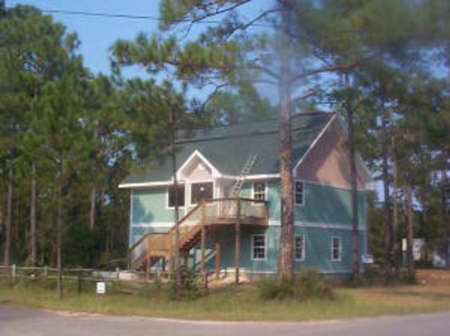 Unique home on huge one-half acre lot. Gorgeous wood floors, double balconies overlooking yard or nature across the street. Oversized two car garage with high ceilings. Home has Hardiplank siding.