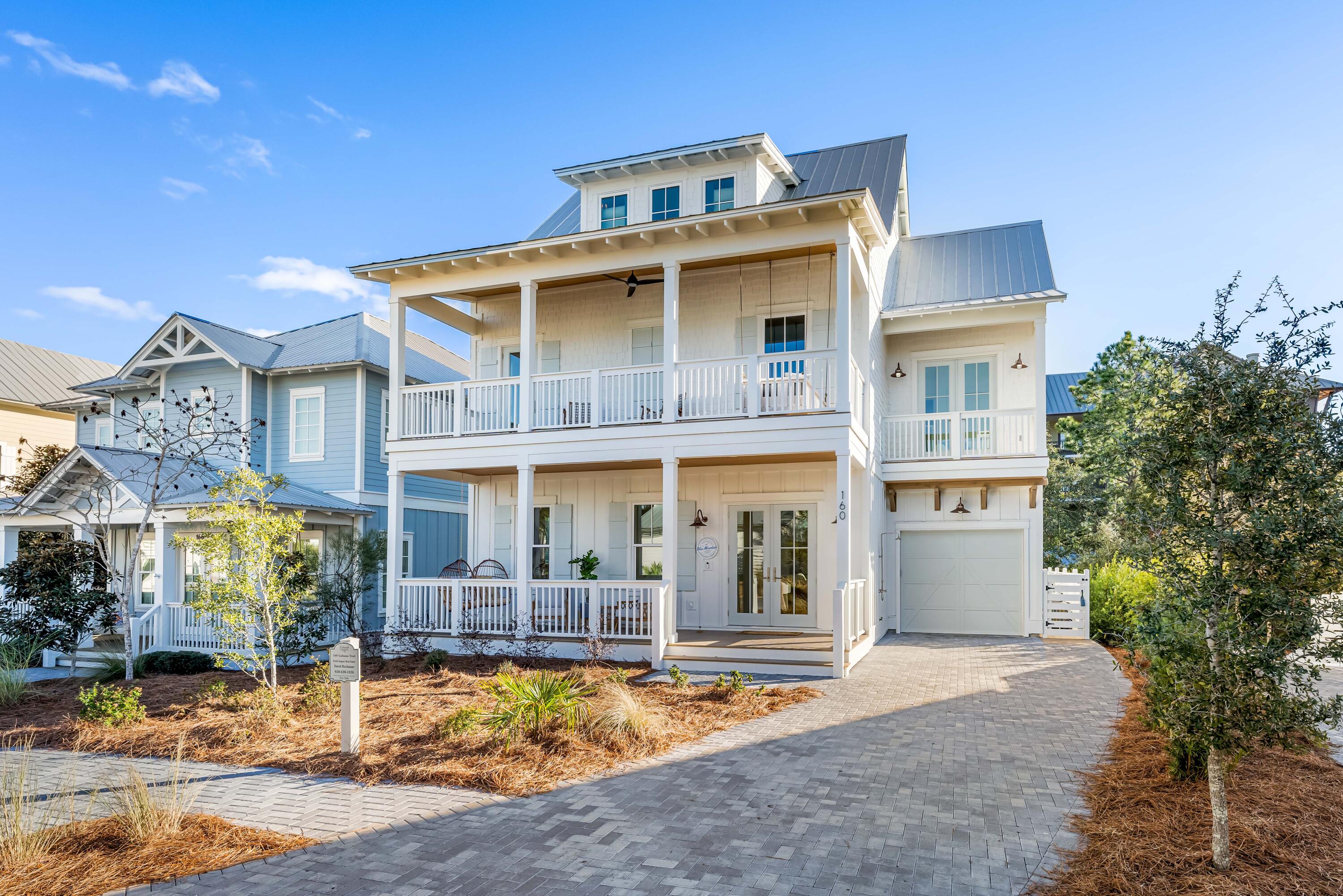 A chance to purchase a truly beautiful home by 'The 30A Designer'. Walk to the beach, to the pool, to grab breakfast lunch or dinner or some amazing ice cream. This new luxury home is being offered by a premier local builder known for the quality and detail of their builds. This home sleeps 18 with multiple common hang out areas. Lakeside Neighborhood is a highly sought after location in Blue Mountain Beach for its close proximity to hiking and biking trails, the beaches, restaurants, and so much more. Water resistant wood floors, Cafe' appliances, plywood cabinets, solid core doors, wood steps, luxurious extra thick countertops, spray foam in roof, walls and under house, and on demand gas water heater. This home comes with with high end finishes throughout the house.