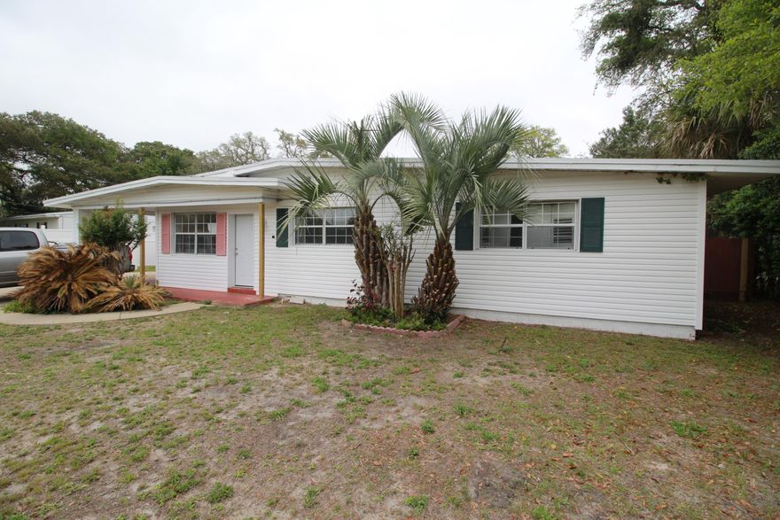 PRICE REDUCED!! This large home in central Fort Walton Beach is brimming with potential for a primary home or investment property, while also offering peace of mind in the updates that have been completed. Major components such as the roof, electrical panel, 2 HVAC systems, the carpet, the water heater, the pool liner, and screens over the lanai are all brand new! The layout offers incredible flexibility to easily make it a 3 bedroom home and to create your dream space, while the backyard is your own private oasis with a large covered porch, screened-in pool with pool bathroom, and ample yard space for kids or pets. Nestled near Eglin AFB and Hurlburt Field, this property is perfect for investors or anyone looking to build equity while customizing their own home!