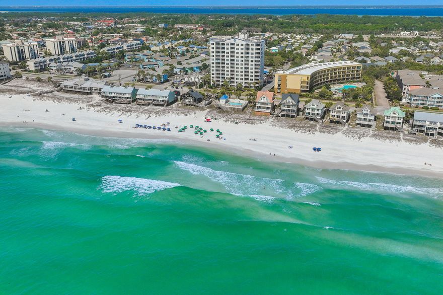 Incredible, unimpeded views are offered from this spacious and fully furnished 9th floor, 2 bedroom/2 bath condo at Leeward Key featuring new stainless steel appliances and new guest room furniture. Enjoy gorgeous views of the emerald green waters from the living, dining, and kitchen area as well as the master bedroom. Features include tiled flooring throughout, wainscoting in the main living area, granite countertops and double vanity and tiled shower in the master suite. Amenities at Leeward Key are first class and includes 100 feet of white sand beaches with private access, two pools, with the heated pool located directly on the beach side and the other one just on the North side of the building, fitness room, and grills. Tons of shopping and restaurants are located very nearby as well. Come take a look at why Leeward Key is such a popular location! Buyer to please verify all information contained herein. 