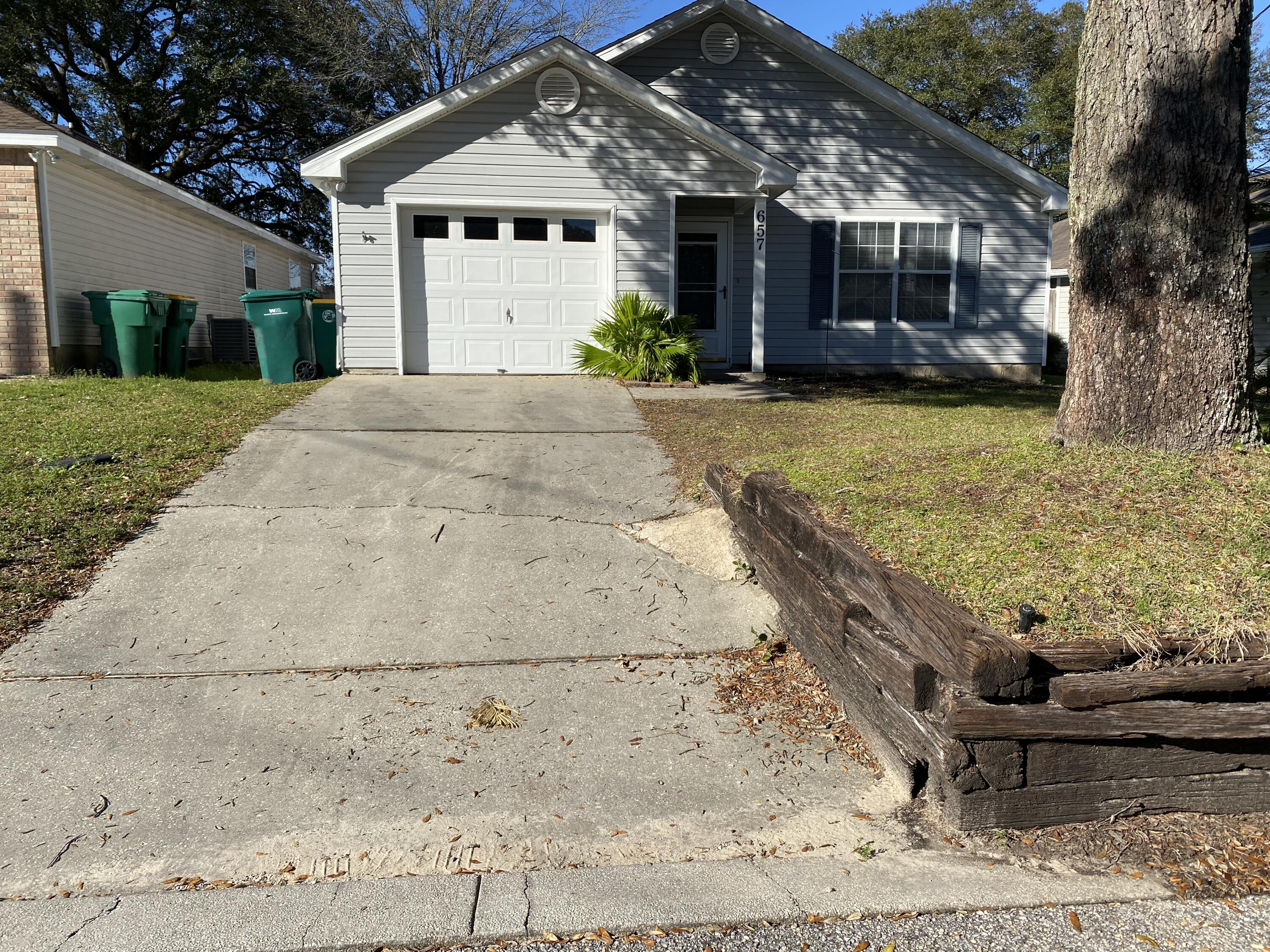 VA ASSUMABLE at 3.75%! Middle of Town, Perfectly Situated Between HURLBURT FIELD, EGLIN AIR FORCE BASE, Hospital, Shopping and the BEACH! AFFORDABLE HOMEOWNERSHIP. This One Story Home has Been Well Maintained. Roof (2017), HVAC (2018), and Hot Water Tank (2024). 10ft Ceilings Grace the Main Living Space with Kitchen and Dining Area Adjacent. The Master Bedroom is Toward the Back of the Home for Added Privacy.  The Back Yard is Privacy Fenced and Level. Come See! (buyer to confirm measurements)