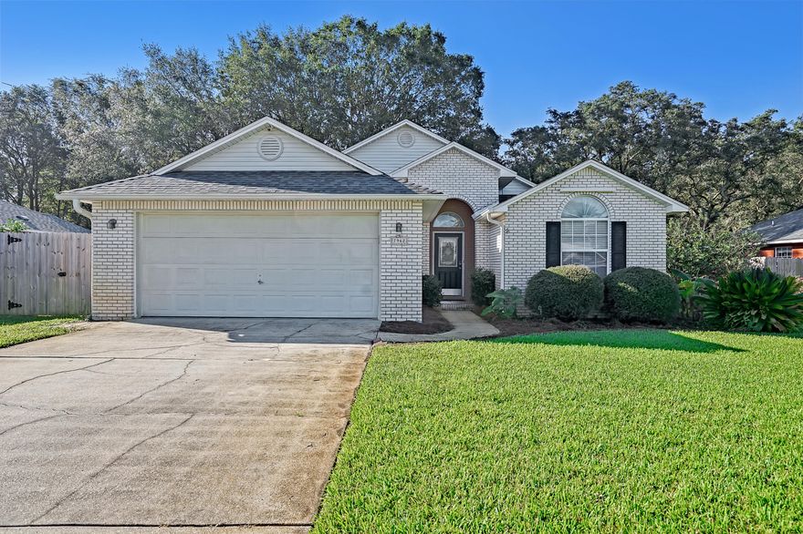 Beautiful well maintained all brick home with a 4 year old roof in the waterfront Villa Danielle community. Just minutes away from the beautiful Navarre Beaches. Easy access to Hwy 98 and close to all that Navarre can offer. Enter into the arched crown molded hallway that opens to the spacious living room and dining area. The kitchen offers stainless steel appliances, ample counter and cabinet space. The master suite offers a his and hers walk-in closet, dual vanities, garden tub, separate stand-up shower with a new glass door, linen closet and porcelain tile. A screened-in back patio with ceiling fan, GeoSpring water heater, updated garage door motor, gigabit ethernet throughout the house, new garbage disposal, z-wave smart home exterior lighting,