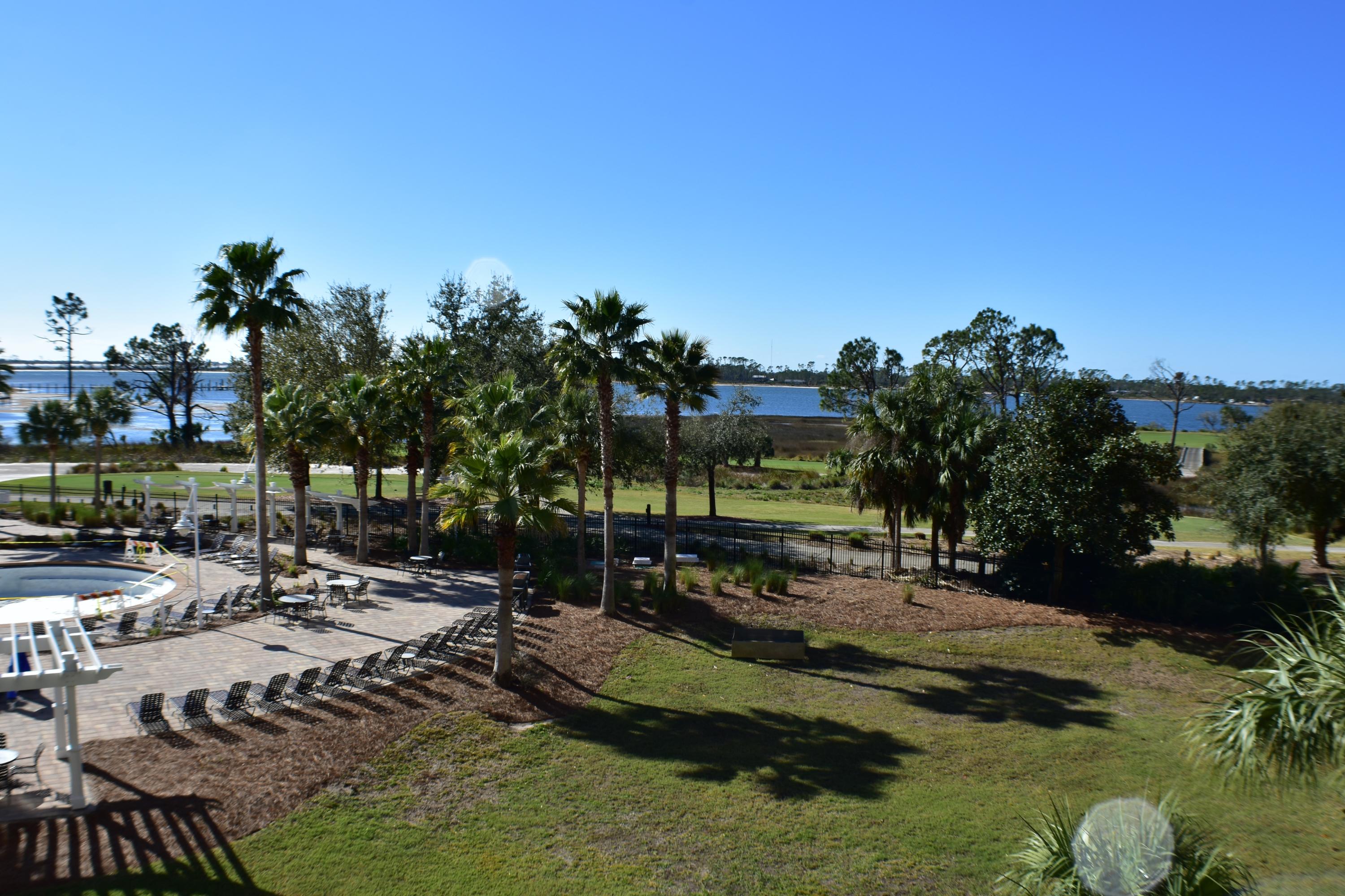 Beautifully furnished and rental ready Reflections condo! This is a 2BR/2BA third floor unit with private balcony that overlooks the Grand Lagoon. The unit features a split-bedroom floor plan with wood-look ceramic tile, granite counters, crown molding, and double vanities and custom tiled shower in the master bath. This is a great building which contains a full service salon and spa just downstairs, a 10,000 sqft pool, hot tub, and spacious sun deck. Bay Point Resort amenities include a Jack Nicklaus designed golf course, world class tennis courts, 24 hr security, a playground, and will soon have again, a completely brand new full service marina. All info is approx and must be verified by Buyers if important.