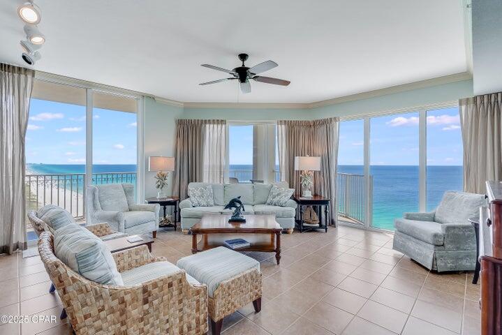 Best of the Best in Panama City Beach! Tidewater Beach Resort unit 1917 is a truly exceptional property; a unique, coveted eastern facing corner HUGE wraparound balcony! This desirable ''J'' floor plan is exceptionally bright with 9' ceilings, large glass windows, and 9' sliding glass doors that span across the living area framing breathtaking sunrise and sunset views over the coastline of Panama City Beach.