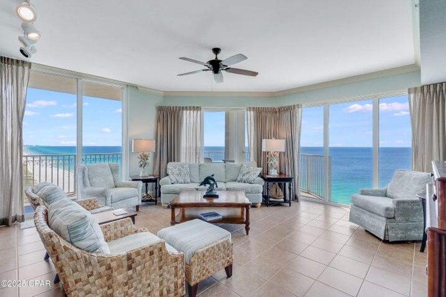 Best of the Best in Panama City Beach! Tidewater Beach Resort unit 1917 is a truly exceptional property; a unique, coveted eastern facing corner HUGE wraparound balcony! This desirable ''J'' floor plan is exceptionally bright with 9' ceilings, large glass windows, and 9' sliding glass doors that span across the living area framing breathtaking sunrise and sunset views over the coastline of Panama City Beach.