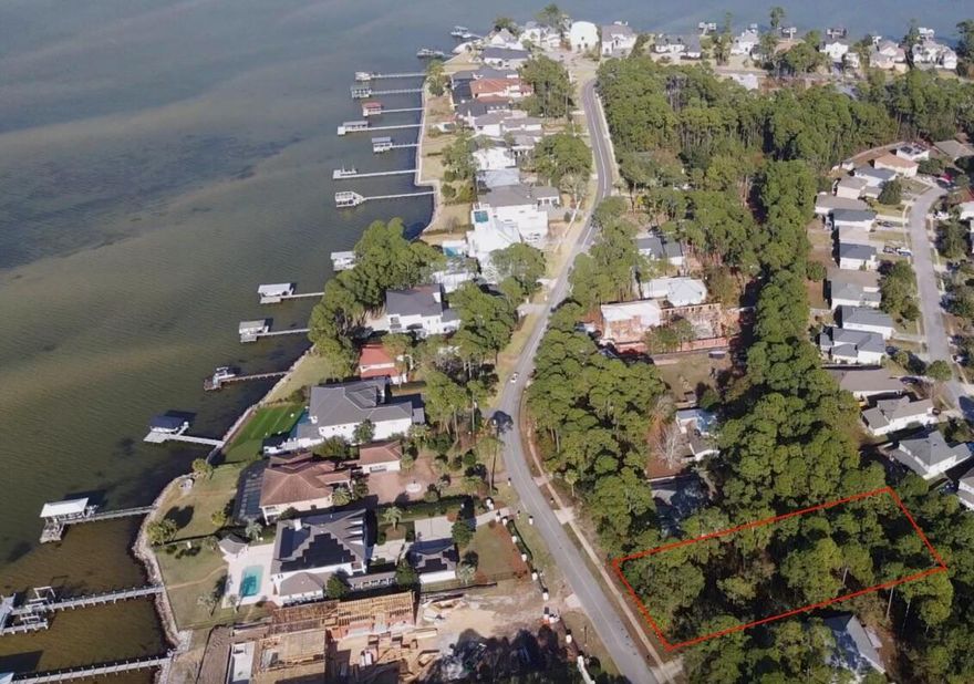 Build your dream coastal retreat on this exceptional homesite in Santa Rosa Beach with sunset views over the Choctawhatchee Bay! This 0.59 acre lot offers the rare combination of proximity to the water, privacy, and flexibility -- with no HOA restrictions!Located on a quiet street, this homesite is just steps from a nearby county park with pickleball courts, walking trails, and expansive green space for everyday enjoyment.Whether you're creating a primary residence or a coastal getaway, this homesite delivers the perfect balance of natural beauty, freedom to build, and an unbeatable Santa Rosa Beach location!