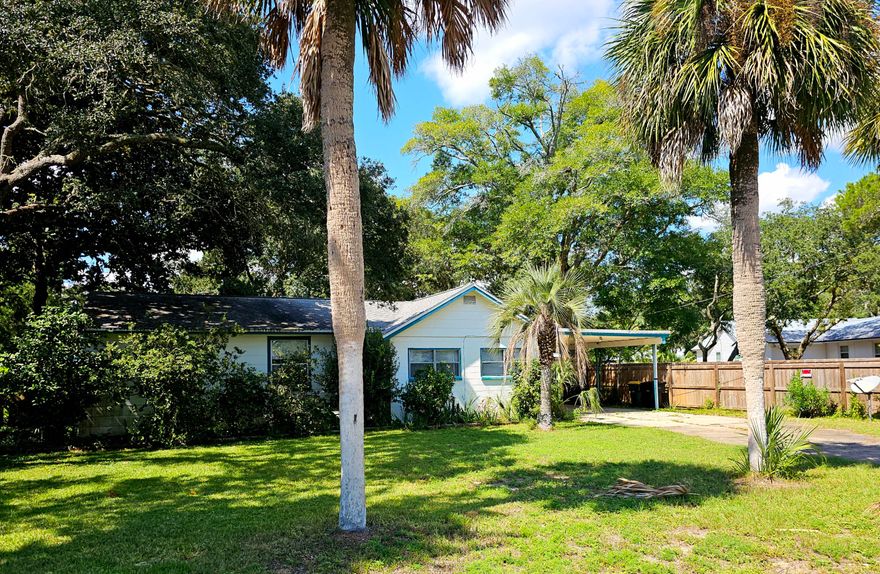 This is the perfect opportunity to 'own in' the popular bayside Garniers Beach neighborhood, and a perfect opportunity to make this home your own. THE HOME NEEDS SOME WORK and is being sold AS IS.   This cute Florida cottage is unique, with an open concept living/dining/kitchen area, 3 bedrooms, 2 full baths, and indoor laundry.  There is a screened-in back porch, a single carport with outdoor storage and there is a great little storage shed with electricity on the backside of the large lot.    The fenced-in backyard is an open invitation to enjoy mother nature while providing a sense of privacy.  Garniers Beach Park and all that it offers is within 2 blocks of this home.  This property is located within the Fort Walton Beach City limits and is convenient to all area Bases, beaches, golf, downtown, shopping, and Cinco Bayou boat ramp!  Whether you're entertaining guests or simply relaxing with family and friends, this inviting space offers the ideal setting for year-round enjoyment. Owners have never occupied the residence and are only aware of conditions readily observable for disclosure purposes, ( i.g. a gutted bathroom, the back porch area needs to be rescreened, not sure of any systems, etc).   Don't miss the chance to make this delightful home yours!  CASH ONLY.   Buyer(s) is responsible for verifying all data and information including lot size and room measurements as it is deemed to be reliable but not guaranteed.