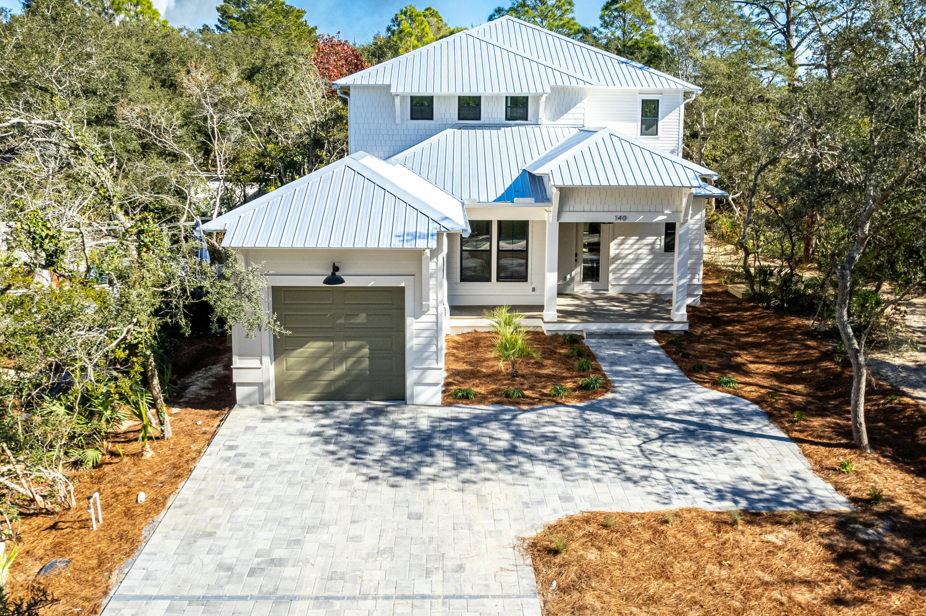 Introducing a custom new construction completed in 2025, this 5-bedroom, 4.5-bathroom custom home is nestled just off 30A in the desirable Seagrove Beach. This home is ideal as a rental investment, a second home, or a primary residence.As you step onto the inviting front porch, you're greeted by view of a private backyard oasis, complete with a heated pool and surrounded by lush trees. The first floor has a bright, open kitchen equipped with a butler's pantry and a beverage station featuring a drink refrigerator and ice maker. The primary suite on this level offers a spacious walk-in closet and an en suite bathroom adorned with floor-to-ceiling tile, a soaking tub, and a separate shower. Seamlessly blending indoor and outdoor living, the first floor extends to a large covered porch that overlooks the pool and the privacy of the tree-lined lot. The back porch is prepped with water, gas, and electric connections, ready for your personal touches of built in grill our outdoor kitchen. Rental projections of $200k in documents.

The second floor features four additional bedrooms. Bedrooms two and three offer en suite bathrooms and ample closet space, with direct access to a large screened-in back porch overlooking the pool. The sounds of the gulf just at the end of the street can be heard while relaxing on the porch.  The fourth and fifth bedrooms share a full hallway bathroom, ideal for a bunk room or king-sized beds. The upstairs is surrounding by trees offering a feeling of privacy at the beach.  

Situated in Gulf Shore Manor, this home is less than 0.4 miles from the beach, on a quiet dead-end street with a 30-foot buffer to Grove By The Sea, ensuring no neighbors on the west side. The community offers multiple beach access points, including the Santa Clara Beach Access with seasonal lifeguards and a ramp to the beach. As a non-HOA community, Gulf Shore Manor provides deeded beach access spanning 1400 linear feet from Dothan to Pelayo.