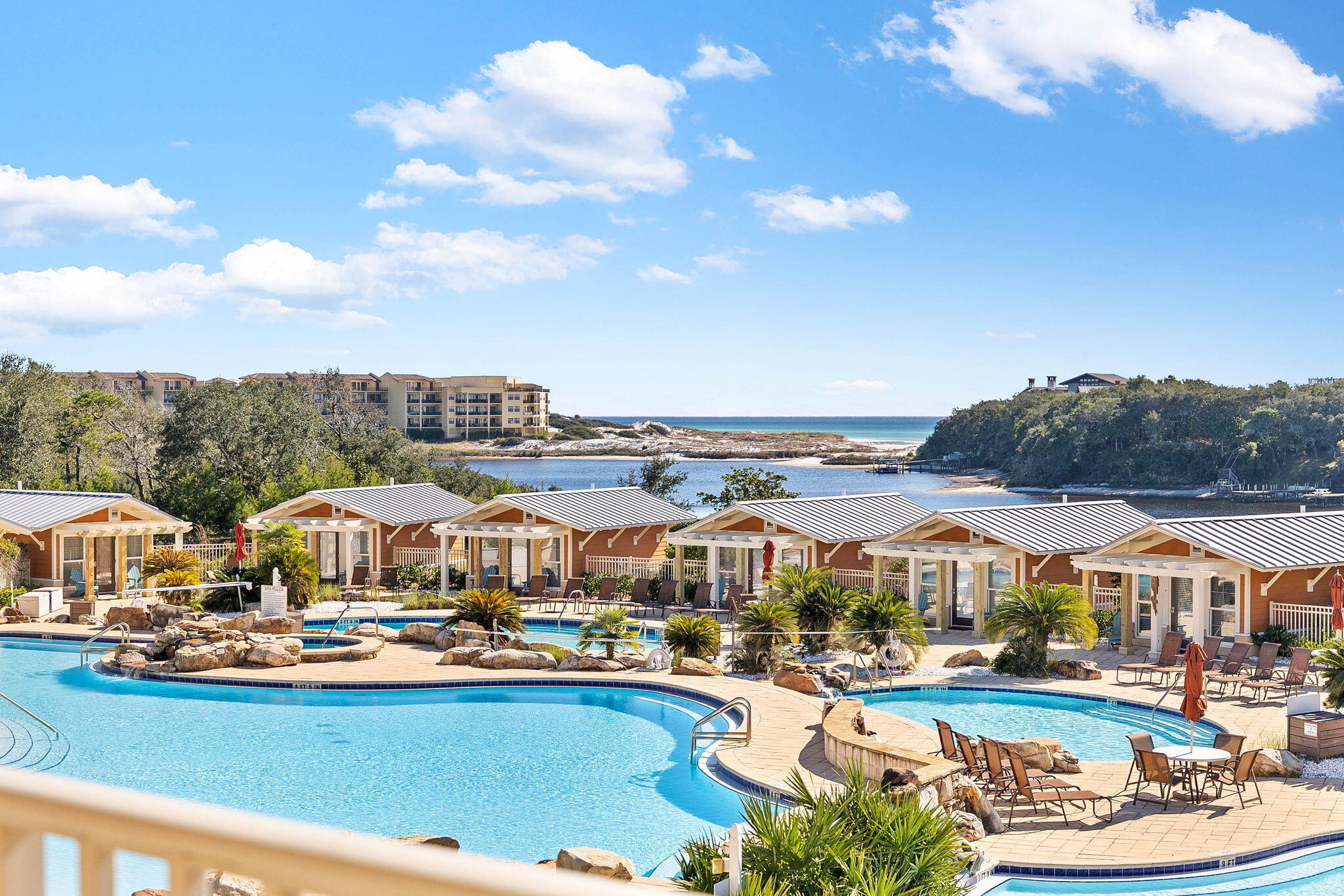 *Seller is now offering to for the remaining HOA payments in 2025!!!* Experience resort living in Blue Mountain Beach in a spacious 1,778-square-foot single-story retreat with 10ft ceilings, offering panoramic views of the Gulf of Mexico and Redfish Lake. Luxury meets serenity in this 3-bedroom, 3-bathroom condo thoughtfully designed with a split-bedroom floor plan that ensures privacy and comfort.The gulf-facing primary suite is a true sanctuary, complete with private patio access and breathtaking views. The open-concept living area features a cozy fireplace and flows into a large kitchen with a raised bar island, pantry, and a dining space that accommodates 8-10 guests. Step onto the deep, covered southern-facing patio to taking in the serene views of the rare dune lake and Gulf while staying cool, shaded, & listening to the sounds of the waves; ideal for relaxing or entertaining.
The beach access is effortless, with a private captained pontoon boat available seasonally from the community dock and complimentary golf cart rides in the off-season. For those who prefer a leisurely walk, the gated beach access along Scenic 30A is just a short stroll away.
This exclusive community features exceptional amenities including three resort-style pools (one adult-only and one heated), two jacuzzis, and private pool cabanas for the ultimate relaxation. The expansive pool deck also includes two grills and a large fire pit for an outdoor dining experience. At the lake, there is a covered dock where guests can relax, fish, or board the pontoon boat for the scenic ride though the dune lake to the beach. The community also boasts a fitness center, private covered parking, and a private owner storage cage.
Sold fully furnished and rental-ready, this condo has a solid rental history with families returning year after year. Whether you're seeking a second home, a vacation rental investment, or a permanent residence, this property offers the perfect blend of luxury, convenience, and coastal charm in the heart of Blue Mountain Beach and 30A.