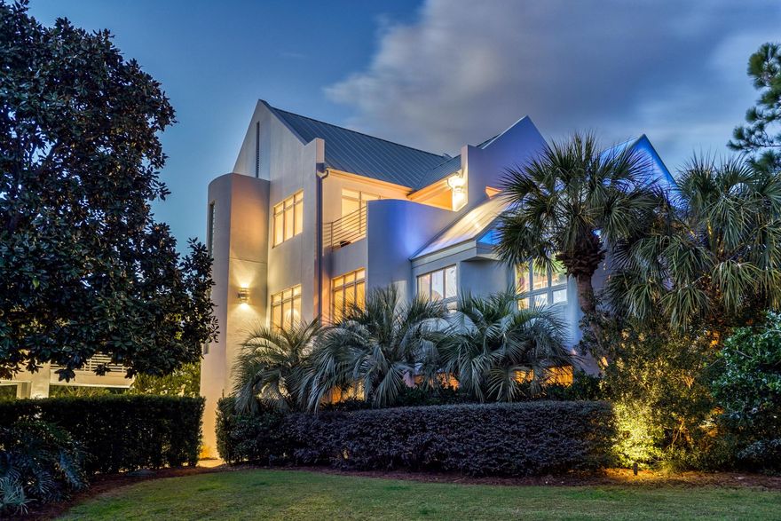This custom one of a kind Alan Ficarra jewel, perched in the gated community of Seclusion Dunes, boasts an iconic view of Deer Lake and has Gulf views from the 3rd floor. The Master Suite faces East. Wake up every morning to beautiful sunrises, and then have Coffee on the balcony while you take in the Gulf breeze. On the second floor of this spectacular custom build is a distinctive zen-like solarium which contains both a ventilation system with rheostat with separate heat and a/c. T Its glass polymer roof allows for 55% sunlight and 1% UV light for plant health into the room. The roof is wind and impact rated to meet Dade County specifications. The 21,500 SqFt. lot features mature, manicured grounds, two irrigation systems and low voltage outdoor landscape lighting.