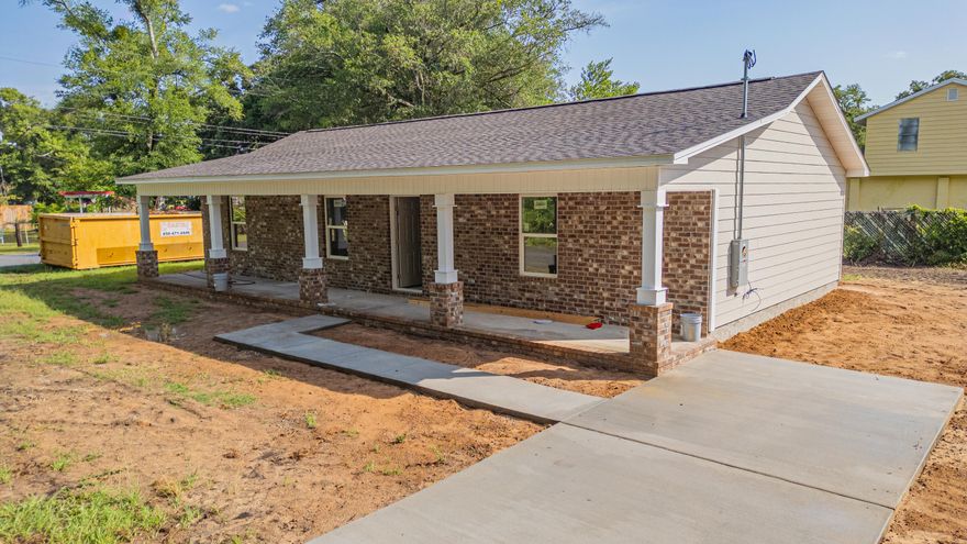 Beautiful new construction home situated on a corner lot. This cottage home offers a 300 square foot front porch over looking the front yard. Inside you'll luxury vinyl plank flooring through out. The large living room will allow for oversize furniture. The kitchen has custom wood cabinetry, pantry, energy star rated stainless steel appliances and is open to the dining area. Large laundry room off the kitchen. Other features, LED lighting through out and ceiling fans in the Living room and all three bedrooms. The exterior will feature a brick front and the rest of the sides will be low maintenance vinyl.