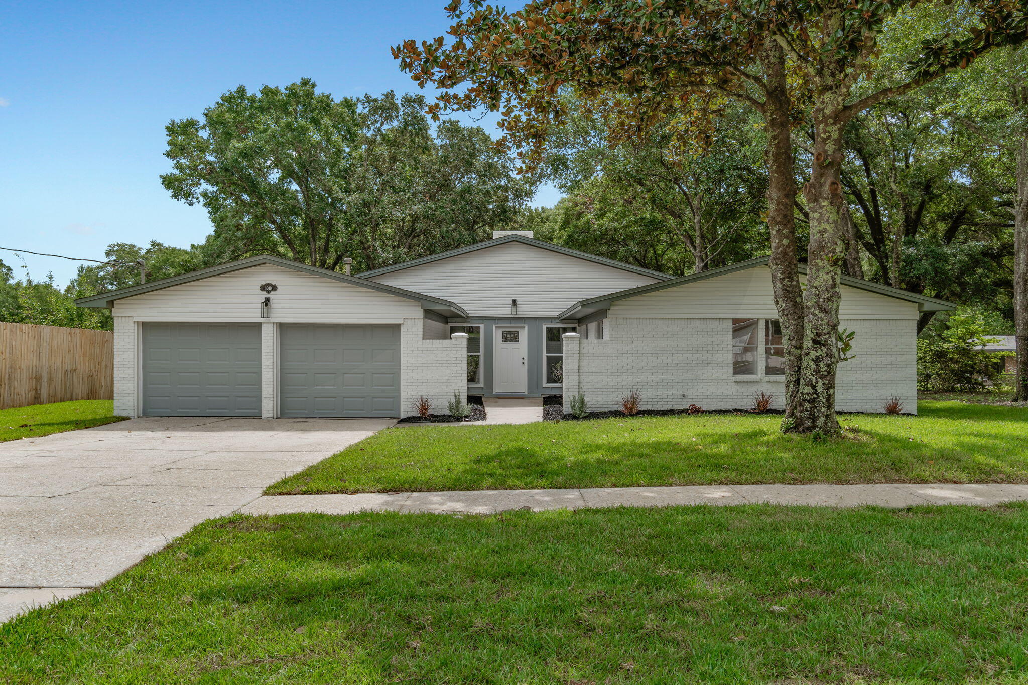 RARE OFFERING IN THE HEART OF NICEVILLE! PROFESSIONALLY RENOVATED LAKEFRONT HOME NEAR SCHOOLS & TUCKED AWAY ON A NEARLY 3/4 Acre Lot with great curb appeal. This home is only 2 blocks from Niceville High School and Ruckel middle school, and close proximity to all grocery stores and restaurants. Enjoy 4 bedrooms, 2 bathrooms, 2-car garage, FRESH INTERIOR PAINT, NEW HVAC, NEW WATER HEATER, New ROOF in 2016, and a plethora of second-to-none IMPROVEMENTS. This spacious and open floor plan home with character would make the perfect primary residence! You will enjoy the brand new Luxury LVP floors and custom shiplap accents throughout. When you walk in, you will notice the spacious and open living area with a new gas fireplace, wooden mantle, and shiplap wall. To your left the living area will open into the oversized kitchen and dining areas. Your BRAND NEW KITCHEN features new cabinets, Premium quartz Cambria Calcutta sol Viaterra, brand NEW matching stainless steel Whirlpool appliances, an island with undermount sink and breakfast bar, and a pantry. Off the dining area and through the new barn door will open up into a multi-use additional living area with an abundance of natural light and lake views which would make the perfect office, game room, family room, second living area, and/or a bar room. On the right side of the home you will find the spacious master bedroom with a new sliding glass door leading to a private patio area and featuring a completely renovated master bathroom with a custom tile walk-in shower, double vanity with undermount sinks and new plumbing fixtures, and a walk-in closet. You will also find the 3 additional bedrooms, linen closets, and the spacious second bathroom with updated double vanity, new hardware and plumbing fixtures, and the tub/shower combo! Your expansive fenced-in backyard is second-to-none with Pine Lake frontage and an abundance of opportunities for use. Recent improvements also include new exterior paint, brand new IMPACT RESISTANT garage doors, New St. Augustine grass and irrigation, new flower beds, new shelving, and new insulation in the attic. With a central location, you are close to a plethora of restaurants, grocery stores, golf, schools, ?? mile to the public boat ramp at Lion's Park, and a short car ride to the sugar white sand beaches of the Emerald Coast! Call today to schedule your private showing! *Buyer to verify all data, information, and/or dimensions provided herein and deemed important to Buyer prior to submitting an offer.