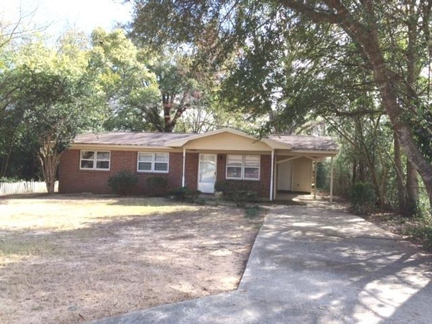 All brick 3 bedroom home ready for a family. Seller recently replaced some flooring and did some bathroom updates. Large level front and back yard. Inside laundry area. Back covered patio. Carport and storage. For the cook, wall oven, cook top, dishwasher, pantry and plenty of cabinets.