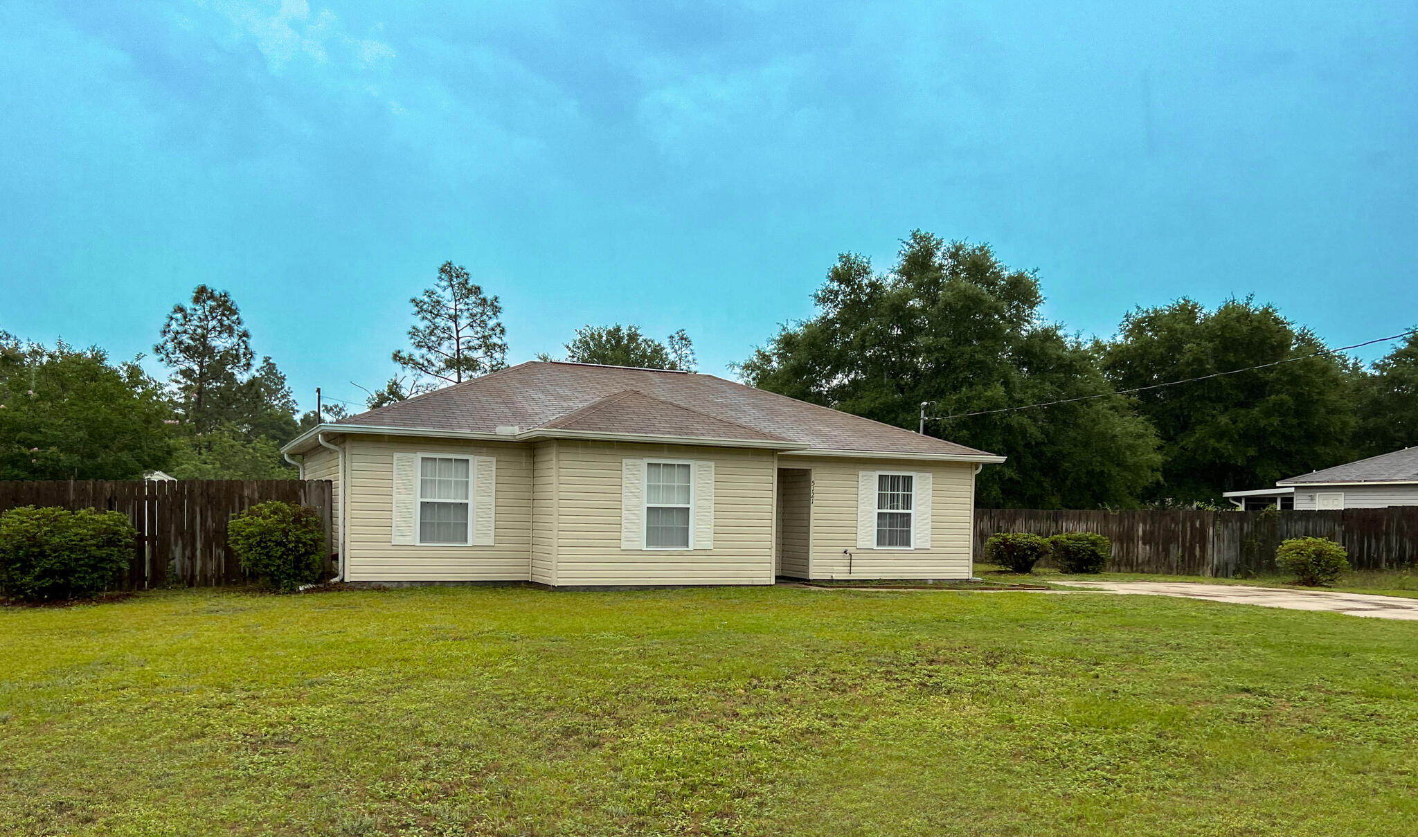 In Multiple Offers. Asking for highest and best by Tuesday at 5:00 pm. Here's the one you've been waiting for. Home has a living room, eat-in kitchen with pantry, 3 bedrooms, 2 bathrooms, and laundry room. No Carpet. Wood look laminate throughout. Outback you will find a large screened in porch to enjoy your morning coffee. The yard is .51 acre and includes a big shed for storing your lawn equipment. Easy access to Industrial Park and Bases. No HOA. Call your favorite real estate agent today to take a look at this beauty. Please verify all information deemed important. Home and Shed are Sold As-Is.