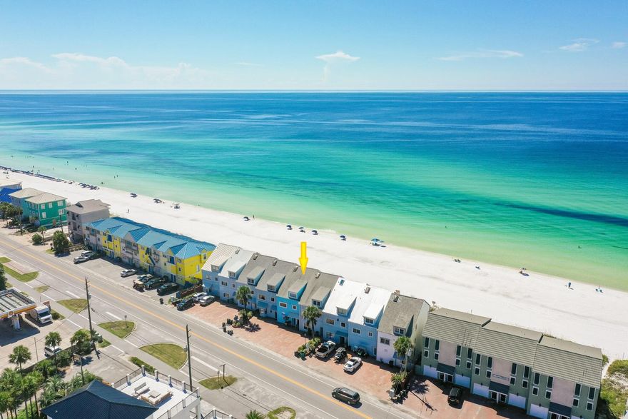 OWN YOUR PERSONAL PIECE OF PARADISE WITH NO HOA FEES DIRECTLY ON THE SAND. As opposed to private 'beach access', this large Gulf front townhome includes 22 ft of EXCLUSIVE, PRIVATE BEACH for ONLY owners & their guests.  Offering stunning Gulf views from almost every room, live the Gulf front lifestyle you've always dreamed of while generating income when you're not there.  Wake up to crashing waves & after a morning walk on the beach, enjoy your morning coffee on your large deck directly on the sand.  This property is like having two homes in one. On the 2nd level, you'll find a spacious living & dining area, kitchen, BR & Bathroom.  The large windows & 18-ft ceiling allow natural light to flood the space, showcasing stunning Gulf views. The white & blue interior creates a modern, beachy feel that perfectly complements the surroundings.  As you ascend to the private, 3rd level master suite, enjoy amazing Gulf views.  An additional bunk area adds versatility to the space.
The 1st level w/ a 2nd living area, kitchenette, BR, BA & another bunk room has newer LVP flooring and offers privacy for guests or extended family members & could be used as a lock out. Enjoy lazy days on the beach, and stunning panoramic Gulf views from the large Gulf front deck just steps to the sand! A large storage room is conveniently located at the back of the deck for hard-to-store items, like bicycles, floats, etc... The 2023 HVAC & NEW ROOF to be installed prior to closing provide affordable insurance & peace of mind. Whether you're looking for a primary residence, vacation home, or investment property, this Gulf front home comes fully furnished & is turn-key.  Seawinds Townhomes is a community of 9 townhomes directly on the beach and unique in that ownership of these properties extends to the water and each owner has a private beach. There is parking for 4 vehicles and NO HOA.  The owners do share in the cost, however, of lighting and landscaping and that volunteer cost is presently $1000 annually.  Perfectly located in the heart of Miramar Beach, you'll have easy access to great restaurants, shopping, golf courses, and tennis facilities. Don't miss out on the opportunity to experience the ultimate beachfront lifestyle.