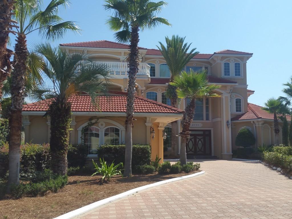 Bank owned home in the gated community of Destiny East. This 3 story home features 5 bedrooms 5 full baths and 2 half baths, granite counters, tile and hardwood floors, cathedral ceiling and crown molding. Separate formal dining room, breakfast nook overlooking the pool and a game room with wet bar. Enjoy the backyard patio with heated in ground pool and hot tub, outdoor shower and bath with summer kitchen. Call today to view before it's gone!