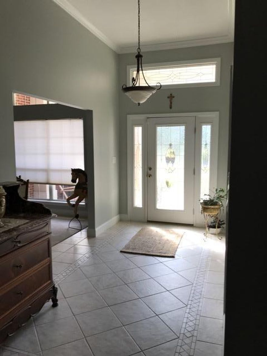 Stunning Bayshore Place home will win your heart. This single story home features 4 large bedrooms & 3 baths. Spacious living room showcases a gas fireplace. Gourmet kitchen with breakfast nook will please any chef with it ample cabinets & counter spaces. Formal dining room makes an elegant setting for holiday dining. There's also a private study. Light & bright bedrooms & master suite offers quiet elegance. Master bath features a his & hers vanity, jetted tub and large separate shower. Sunny Florida room adds to your living space. And for the men, an oversized 2 car garage and additional attic storage. Enjoy the Florida summers on the back patio in the large backyard. Owner will consider dogs but NO cats. Any person 18 years or older must complete separate applications.