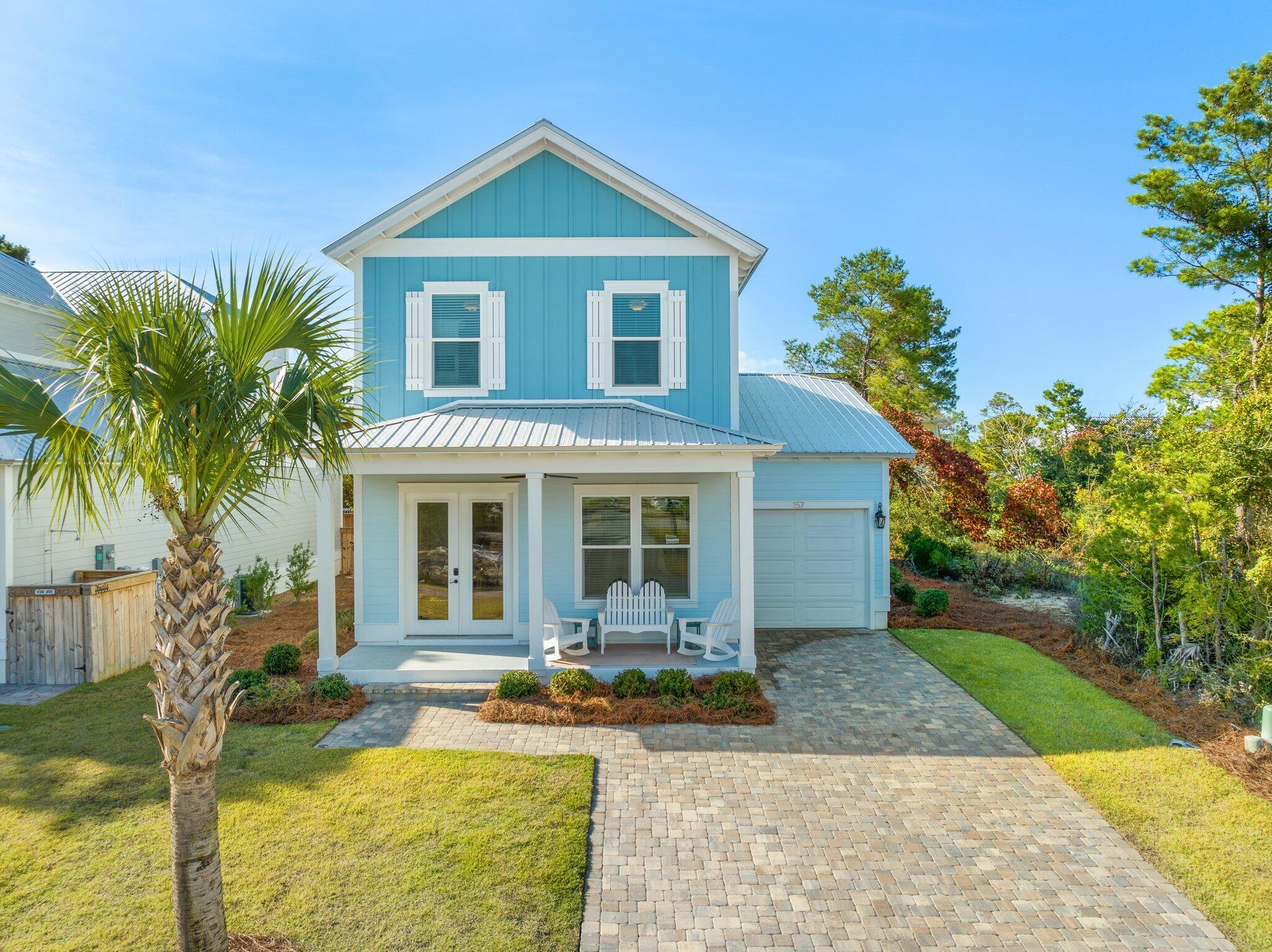 Welcome to this coastal style home featuring quality materials and bold features. Located in the quiet residential community, The Preserve at Inlet Beach. This newer construction home features an open floor plan that includes numerous windows throughout allowing for an abundance of natural light. Enjoy 2 master suites one of which is located on the first floor. The master bedrooms include beautiful en-suites with large closets and oversized walk-in showers. There are 2 additional bedrooms and a large landing/bonus area located upstairs that provides plenty of space. You will also find a spacious screened in back porch perfect for outdoor entertaining. The quaint community offers an oversized pool and outdoor fireplace. Enjoy the viewing deck that overlooks Lake Powell.