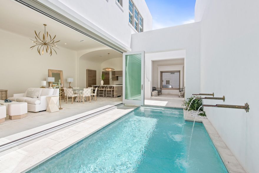 16 Kings Castle Court is the epitome of coastal luxury living. This quintessential home boasts an ideal location along Alys Beach's prestigious Turtle Bale walking path and was designed by town architect Khoury Vogt. The open floor plan, outdoor living spaces and incredible views from the rooftop terrace embody everything you could dream of in a luxury beach home. As soon as you walk into this home, you will immediately be impressed by the gorgeous water features and twelve foot ceilings that direct you to the luxury chef kitchen with state of the art stainless steel appliances and custom designed cabinetry by Kingdom Mills. The open living room is accented with massive bi-folding doors that exhibit the true feeling of indoor/outdoor living at Alys Beach, and the courtyard has an outdoor living space and summer kitchen to enjoy the truly exceptional year-round weather.
This lifestyle home offers two master bedrooms: one on the first floor and one on the second. The first floor master suite is accented with handpicked tile and a custom design architectural vanity. The second floor main master suite is adorned with a whitewashed pecky cypress ceiling, and its private ensuite bathroom features marble floors with an accented marble wall to showcase the stand alone tub. The main master ensuite also includes a walk-in shower and two separate side by side walk-in closets.
There are also two additional guest suites on the second floor, each with a single vanity and walk-in shower. As you enter the additional guest suite you are greeted with a long custom designed arched hallway that makes this fourth room very private. This guest suite has a large custom designed vanity, separate water closet and large walk-in shower.
One of the true gems of this home is the third floor rooftop terrace, with wet bar and incredible northern, southern, and eastern views of Alys Beach. Bottom line, this home one hundred percent embodies all that Alys Beach has to offer and is just steps from sandy white beaches and the emerald green waters of the gulf. Buyer to verify all dimensions.