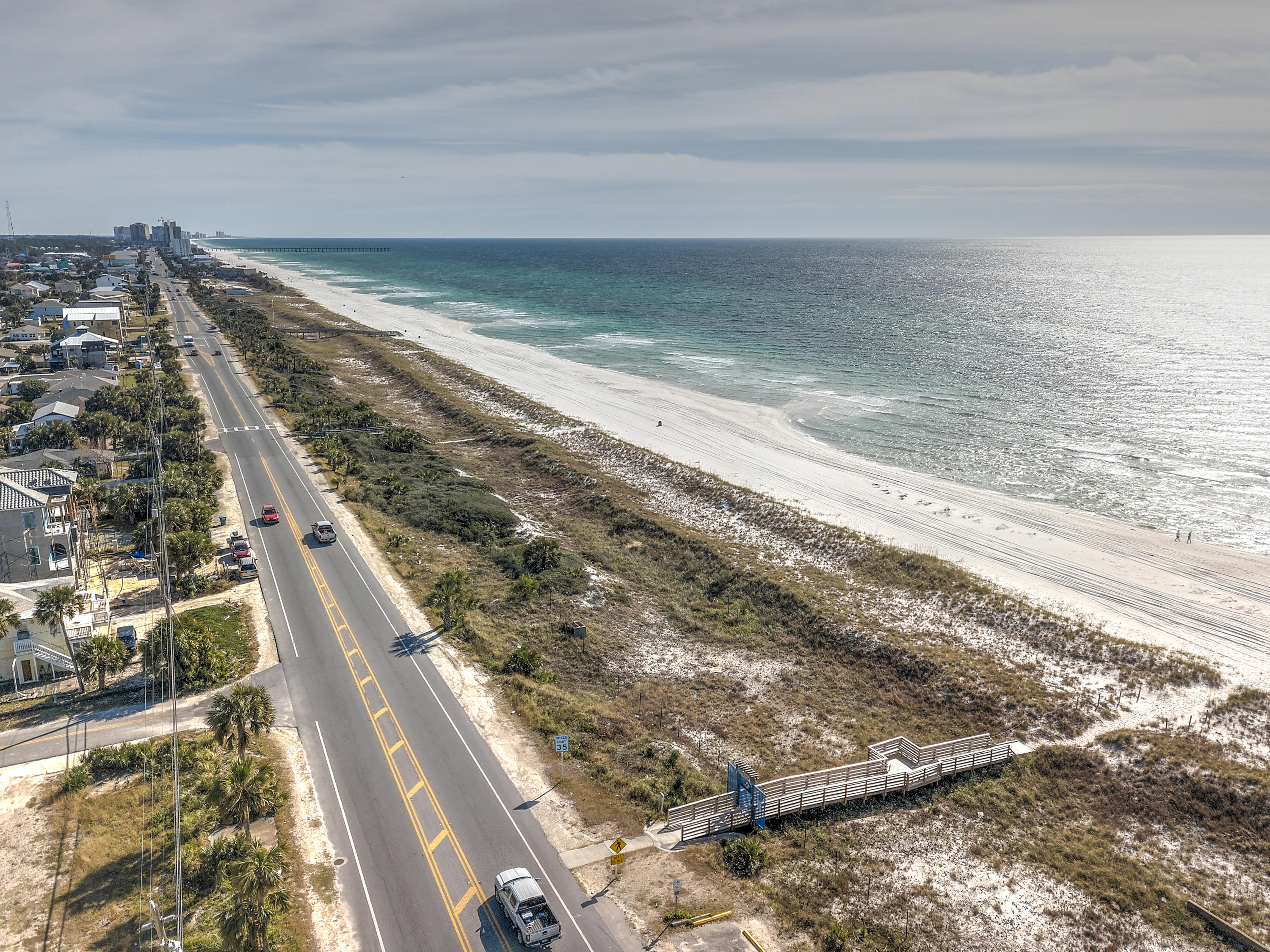 Residential lot in Bid-A-Wee just 3 blocks to over 8 acres of dedicated, gated beach access! Build up and take in the breathtaking views of the emerald green waters and white sandy shores on your own personal balcony! This unique neighborhood is located within close proximity to Pier Park, Shipwreck Island and the NWFL International Airport! Verify measurements and building code if important.
