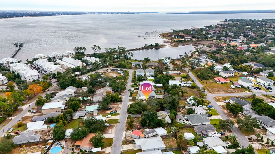Buildable Double Lot - Steps to the Water!Opportunity knocks... and this one is loud. Just one block off the water, this oversized double lot offers flexibility that's almost impossible to find in this part of Panama City Beach. Build two homes for maximum investment potential, or spread out and create one custom coastal dream home with room for everything you've ever pictured.Located just down the road from The Preserve on the Bay and Bay Point, you'll enjoy the convenience of premier neighborhoods--without the HOA fees. That's right... freedom to build what you want, how you want it.A two-story home on this property can capture peek-a-boo water views from the upper level, giving you that daily ''pinch-me'' moment. Even better, the lot sits in Flood Zone X, meaning no flood insurance requirementa rare win this close to the coast.

Whether you're a builder, investor, or someone ready to design your forever beach retreat, this location simply can't be beat.