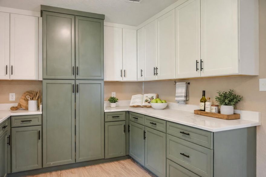 5.25% VA Assumable Loan Available!  Preferred lender offers a 5.75% rate.  Beautifully remodeled Florida cottage on nearly half an acre!Step into this move‑in ready home packed with upgrades and charm. Sitting on almost half an acre, this property features brand‑new flooring, fresh interior paint, soft‑close kitchen cabinets, quartz countertops, a new sink, dishwasher, and range hood. Both bathrooms have been updated with new vanities, and the home includes new ceiling fans, baseboards, doors, electrical updates, a tankless water heater, and HVAC system. The fully fenced yard adds privacy and space to enjoy the outdoors.All the major improvements are already done -- just bring your personal touch and make it yours.