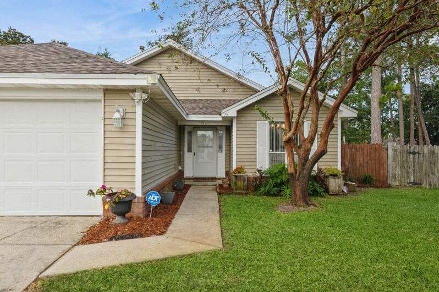 Back on market - no fault of the seller!! $5,000 of 'anyway' money for Buyers!! Welcome home! 411 Springate Court offers a spacious, approximately 1,500 square foot, three-bedroom, two-bathroom property that is only 3.5 miles west of Hurlburt making it a prime location AND it's on a cul-de-sac adding peace of mind with no thru traffic.The recently remodeled kitchen boasts tons of cabinets and counter space ideal for meal preparation and entertaining, newer appliances, and an open-concept design, providing a seamless flow between the living areas. The ensuite primary bedroom features an oversized walk-in closet with custom shelving, bath with a double vanity, more built-in storage, and beautiful updated fixtures.  Both additional bedrooms and the hall closet also feature custom closet inserts for additional storage. The renovated bathrooms feature updated cabinets, counters, fixtures and finishes. 
Throughout the interior, the property showcases luxury vinyl plank (LVP) flooring, creating a durable and easy-to-maintain surface without any transitions. The open-concept layout enhances the sense of space and allows for versatile furniture arrangements. The fireplace is perfect for cozy evenings and lively entertaining with guests. 
This backyard oasis has a pool, seating area, grilling area, plenty of room for all the outdoor activities, storage shed for the extras and new fencing.
This property presents a unique opportunity to enjoy the benefits of a spacious, well-maintained home with modern updates in a desirable cul-de-sac setting just minutes from the beach, dining, shopping, and military bases.

Roof: 2021
HVAC: 2020
Windows: 2024 
WH: Brand new 12/24
Fence on right side replaced 2025 

Call me for a private tour or your favorite Realtor. 
