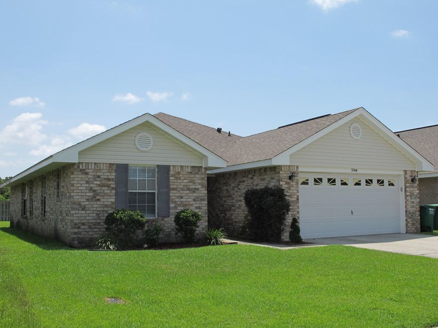 Short Sale. Stylish, spacious and contemporary! This home is very open, with a bright kitchen and big breakfast bar open to the cathedralled living room. There is a split floor plan, with a lavish master bedroom and enormous master bathroom with whirlpool tub separate from the other three bedrooms, in their own ''wing''. Large flat backyard with patio. Great location with access to Tiger Point Park directly at the end of the cul-de-sac over a little walkway! You can also walk to the shopping complex next to the subdivision. Golf course nearby, too! Buyer to verify all data. Square footage source  Santa Rosa County Property Appraiser website. Buyer to rely solely on own appraisal for square footage and own survey for lot size.