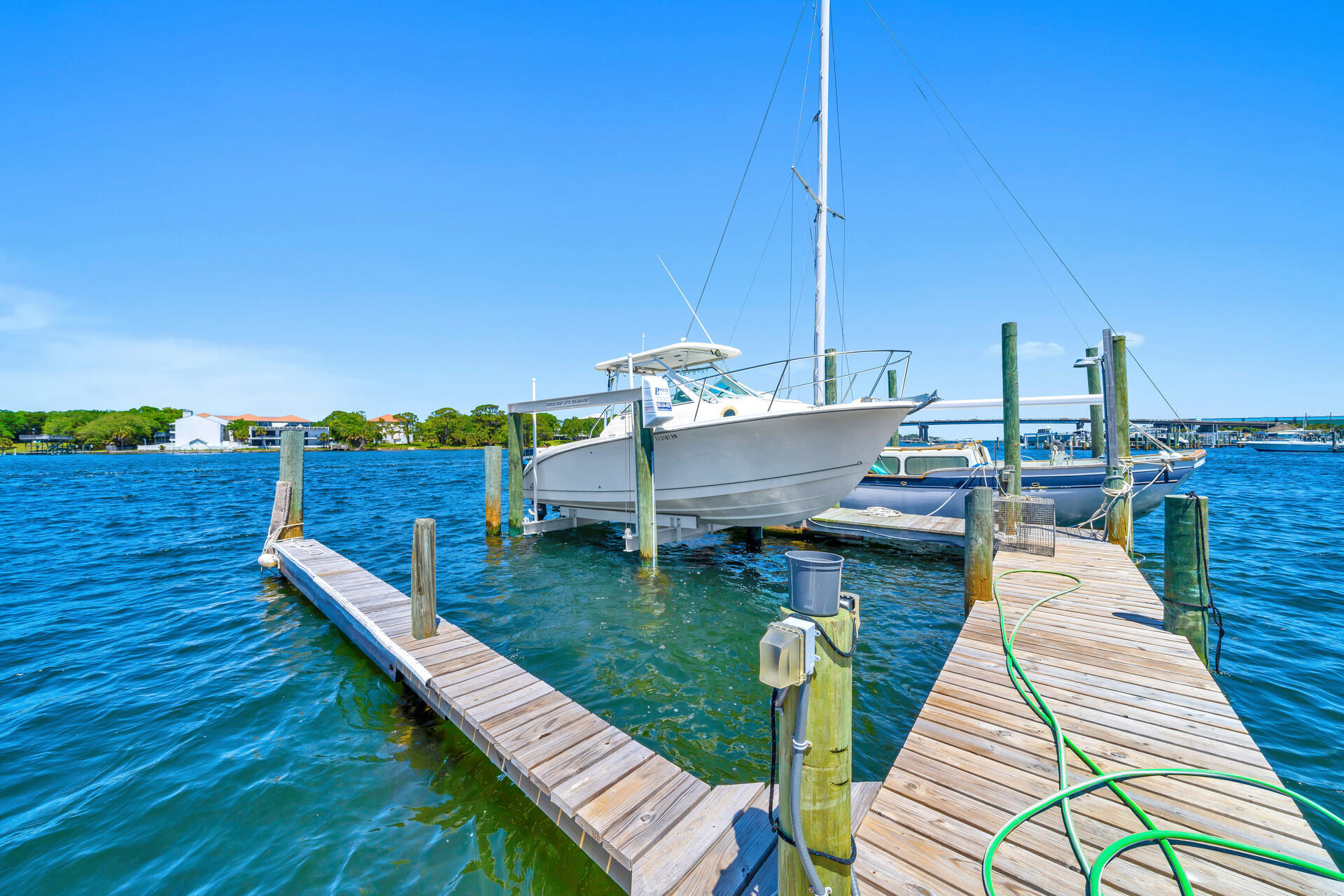 Attention Investors! Short term rentals allowed!You have everything you could want in a waterfront community. This unit comes with a deep water boat slip. A small watercraft ramp is on the property. Enjoy your afternoons watching sunsets from your large patio or step over to the sandy beach and have a cookout with friends and family. Need a beach day? There are 2 convenient public beach accesses a golf cart ride away. Unit 101 has a deeded parking space. There are designated visitor parking spots as well. You can't beat this location. It is in close proximity to entertainment, award winning restaurants, festivals and more! Call your favorite realtor today and schedule a showing.