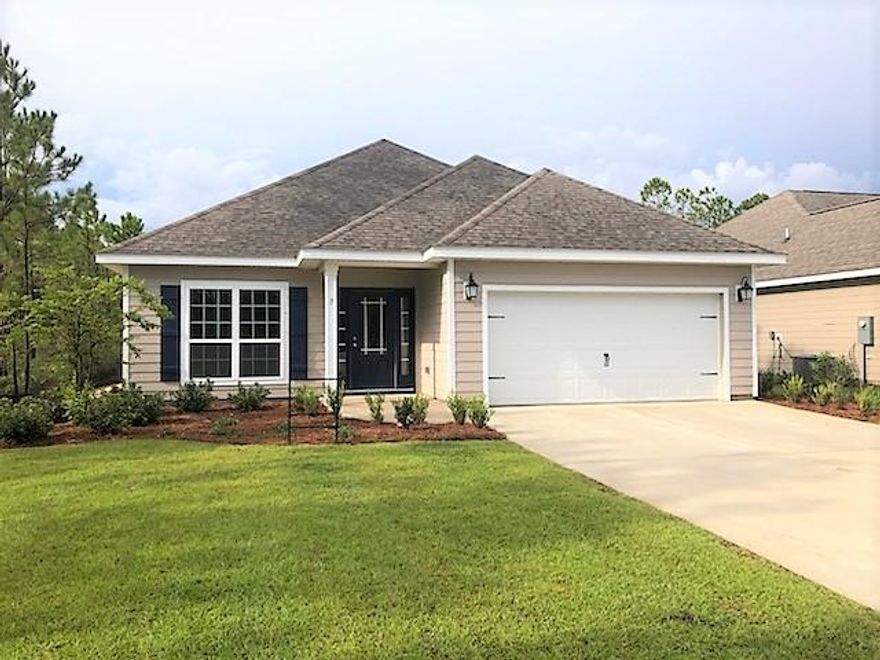 Huge price improvement for quick sale! Ask about our incentives with CC! .79 acres... HUGE BACK YARD backing up to conservation for ultimate privacy. Beautiful single story home located in the heart of Santa Rosa Beach with bay views from the community and where the Gulf of Mexico is just minutes from your home. Ranch craftsman style home features open concept, split and spacious bedrooms, kitchen island with storage, and light recessed panel cabinets are just a few highlights! Kitchen boasts an ample amount of counter space and storage with light granite in kitchen and bathrooms. Eagle Bay Landing is in the heart of Santa Rosa Beach minutes from Grand Boulevard, Sacred Heart Hospital, multiple schools and popular scenic road 30-A! Community pool is now open. This home will not last long!