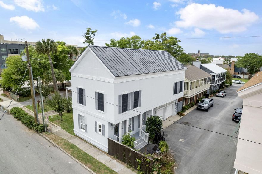 Amazing opportunity to live in the HEART of Downtown Pensacola.  Located only blocks away from Palafox St, Seville Square, and the Pensacola Bay. This home is nestled in the quaint community of the Intendent.  On the first floor, off the foyer you'll find one of three rooms which can act as a bedroom or bonus/flex space, along with a half bath and access to the two car garage.  Once you walk up the stairs to the main living area you will immediately notice the stunning, remodeled kitchen along with vaulted ceilings in the living room with beautiful wood paneling from floor to ceiling surrounding the fire place.  Also located on the primary living area is the second bedroom along with a full bathroom located in the hallway.