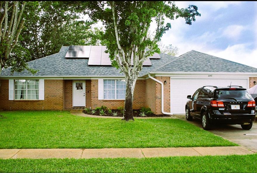 All brick 3 bedroom/2 bathroom home has new LVP vinyl flooring throughout. Spacious eat-in kitchen has beautiful tiled backsplash, granite countertops, pantry, breakfast bar & plenty of cabinet. Stainless steel appliances include refrigerator, dishwasher & smooth top stove. There is a formal dining room and a spacious living area with vaulted ceiling. Large master bedroom has a garden tub, separate shower & two walk-in closets.  Laminate floors in both bedrooms.  Large fence back with room for a pool. Shed is AS IS. HVAC and roof were installed in 2017. Gas water heater was installed Oct 2019. Solar panels installed on East and south side of roof. Have greatly reduced the cost of the electric bill. Seller will pay solar panels off at closing!