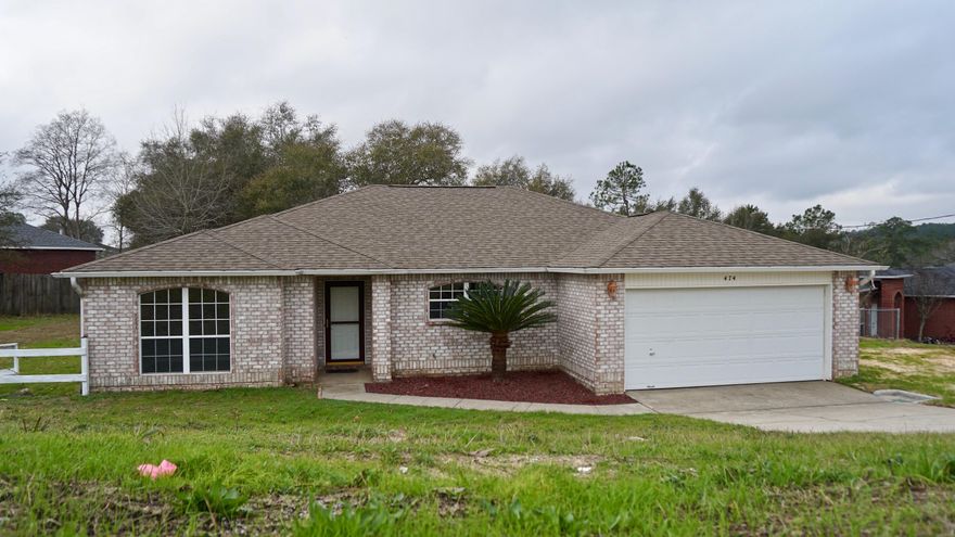The Perfect Open Concept home!! At the front of the home is an ideal space for a home office. The kitchen has beautiful cabinetry, features an island and spacious a dinning area. The living area is opened but separate form the Kitchen and features large cathedral ceilings with wonderful natural light from the full glass door that leads to the back patio & private backyard. Master Bathroom features Dual Vanities, 2 Walk-in closets and private toilet. Both Guest Bedrooms have new flooring, closets and one room with custom shelving. There is a separate Laundry Room off of the kitchen that leads to the garage. This is the perfect family home with the split bedroom plan, cathedral ceilings, entirely hard surface flooring throughout and double walk-in closets. Call agent w/ pet questions.