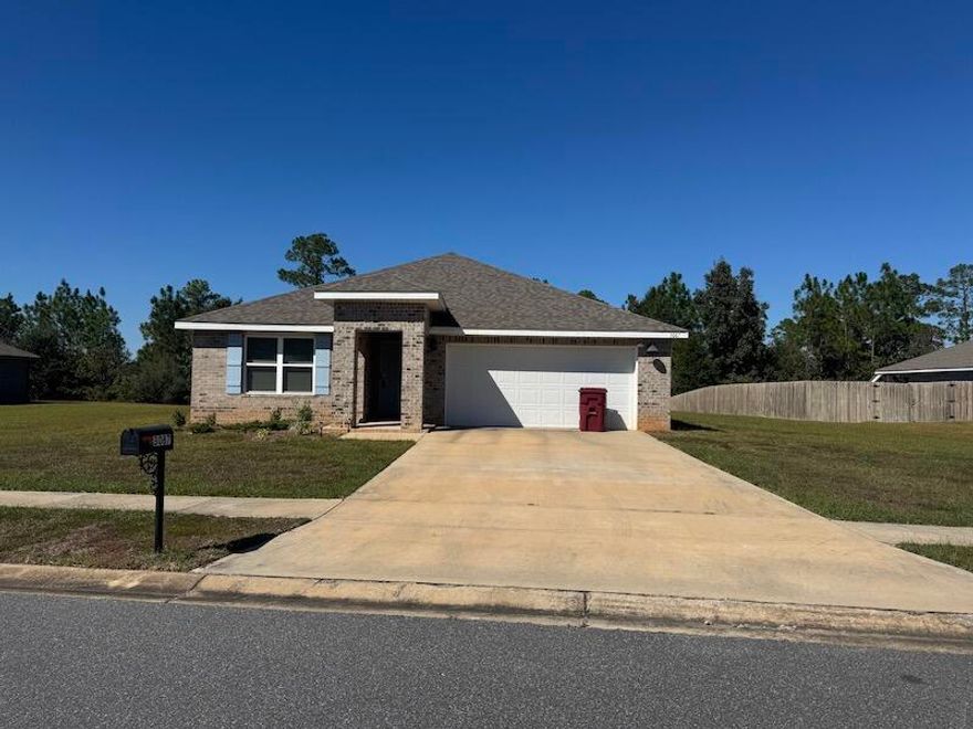 Brick home 4 bedroom 2 bath home in Heritage Plantation, with modern finishes, a covered back patio & 2 car garage. Beautiful kitchen features an island bar for extra seating, stainless appliances, smooth top range, built-in microwave, quiet dishwasher & a desirable open design perfect for entertaining & comfortable everyday living. Beautiful vinyl flooring throughout and carpet in the bedrooms. Master suite features a spacious walk in closet and double sink vanity for additional storage. Property has not fence, NO CATS
