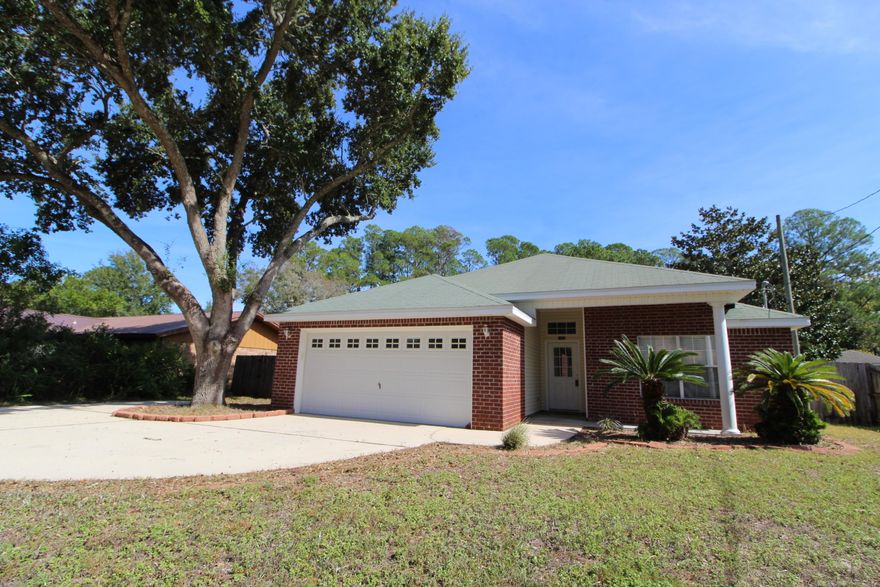 Charming 3 bedroom home in a the heart of niceville. This three bedroom two bath home is perfect for any family. With a large master bedroom and bathroom with a double vanity. The full kitchen features a pantry as well as a breakfast nook. The spacious living room has vaulted ceilings. In addition to the master bedroom there are two other nice size bedrooms and full bathroom. The interior of the home also includes a laundry room with washer and dryer hookups. The back of the house has a fully fenced with a large double gate for your boat or RV. Don't miss out on a chance to own in the heart of Niceville.