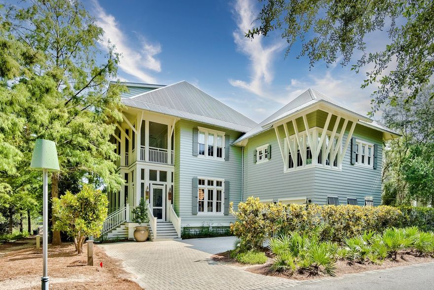 This stunningly remodeled Tom Christ Architecture-Breaux Construction 8 Bedroom, 8 and half bath, light filled home is located on a key lot in Phase 1 - Beach District of Watercolor. This legacy home features 12' and 10' ceilings with detail abound. Completely renovated and upgraded, freshly painted interior and exterior and fully furnished with all new furnishings from HOWSE. New lighting and plumbing fixtures throughout. Bathrooms and kitchen completely updated and boasting new beautiful quartz countertops. Backing up to Western Lake with incredible views from wrap around screened porches on the first and second levels with brand new outdoor furnishings.  You'll find the primary suite on the 1st floor; 4 King Suites, 1 Queen Suite and a Kids Suite with 2 trundle daybeds on the 2nd level,
