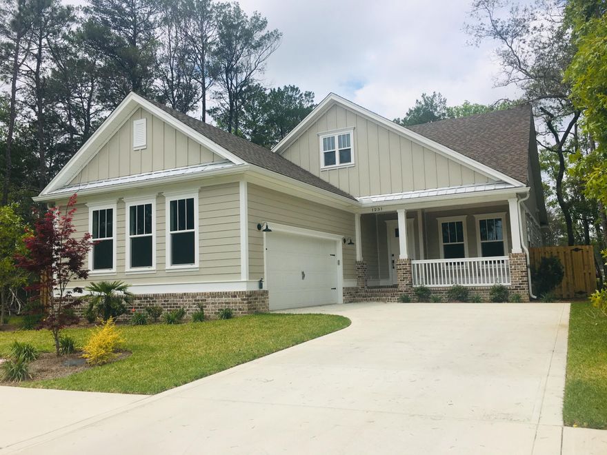 $10,000 Price Improvement! NEW CONSTRUCTION, Craftsman style 3BR, 2 1/2 BTH home in Niceville's newest residential community, DEER MOSS CREEK ! This quality home has a dining room/ office as you enter, with built in, custom cabinets that flows into the open concept kitchen and living room area. White, shaker cabinets and quartz countertops in the kitchen plus Kenmore Elite SS appliances .Amenities include 'Rinnai ' tankless hotwater heater, energy saving spray foam installation, hickory wood floors and impact resistant windows. Large laundry room w/ tons of cabinets, shiplap mud room off the oversized garage. Soaking tub & walk in tile shower in master bath. 2 additional bedrooms on 2nd floor w/full bath and double vanities. Bonus storage space under the stairs. Fully fenced in yard.