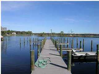 Deep water boat slip! Open floor plan with granite counters and stainless steel appliances in kitchen. Oversized conventional oven, plus a separate convection oven. Tiled floors and wood steps. Wood-burning fireplace. French doors lead to open patio. Sorry smoking and pets are not allowed.